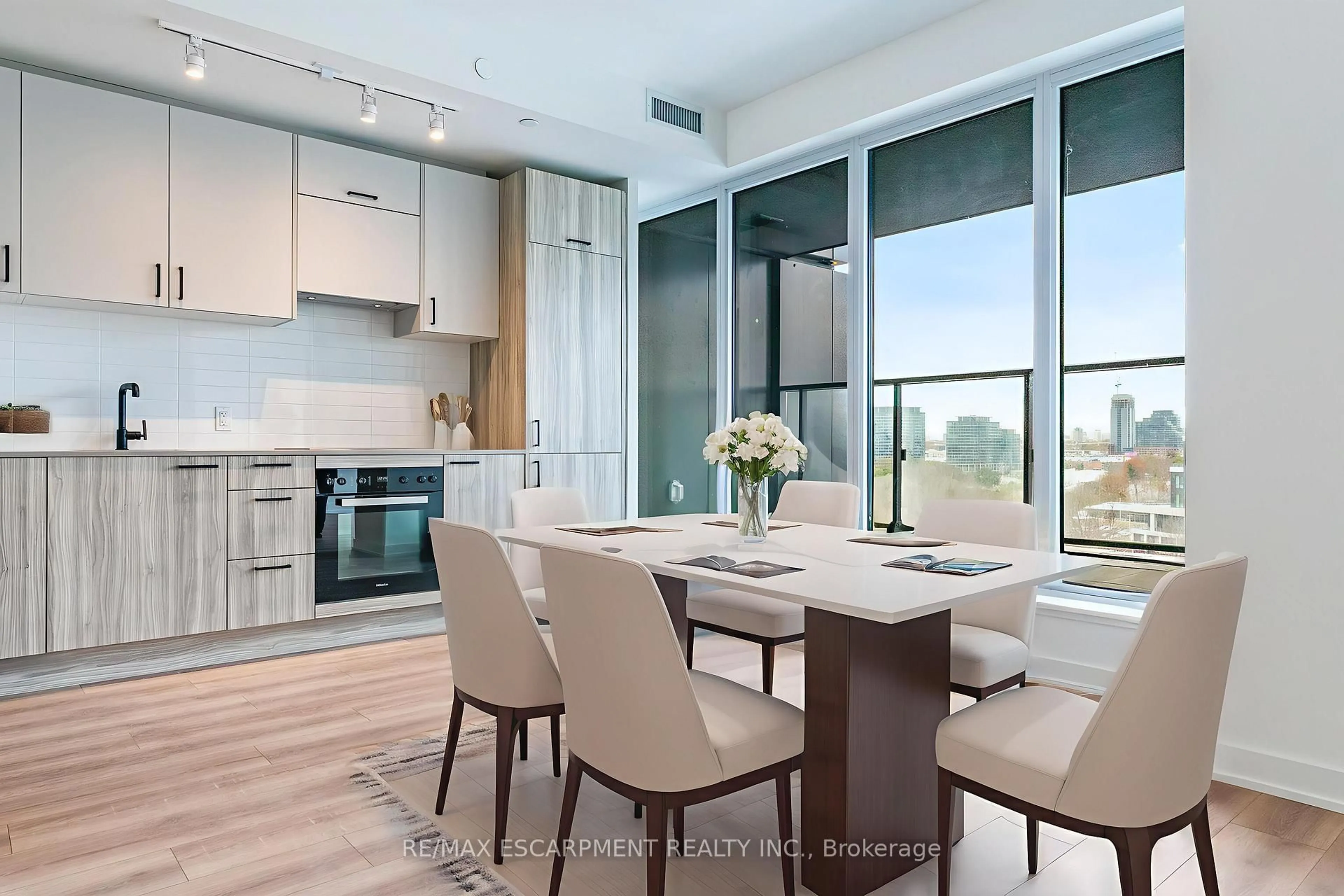 Open concept kitchen, unknown for 1 Quarrington Lane #715, Toronto Ontario M3C 0S4