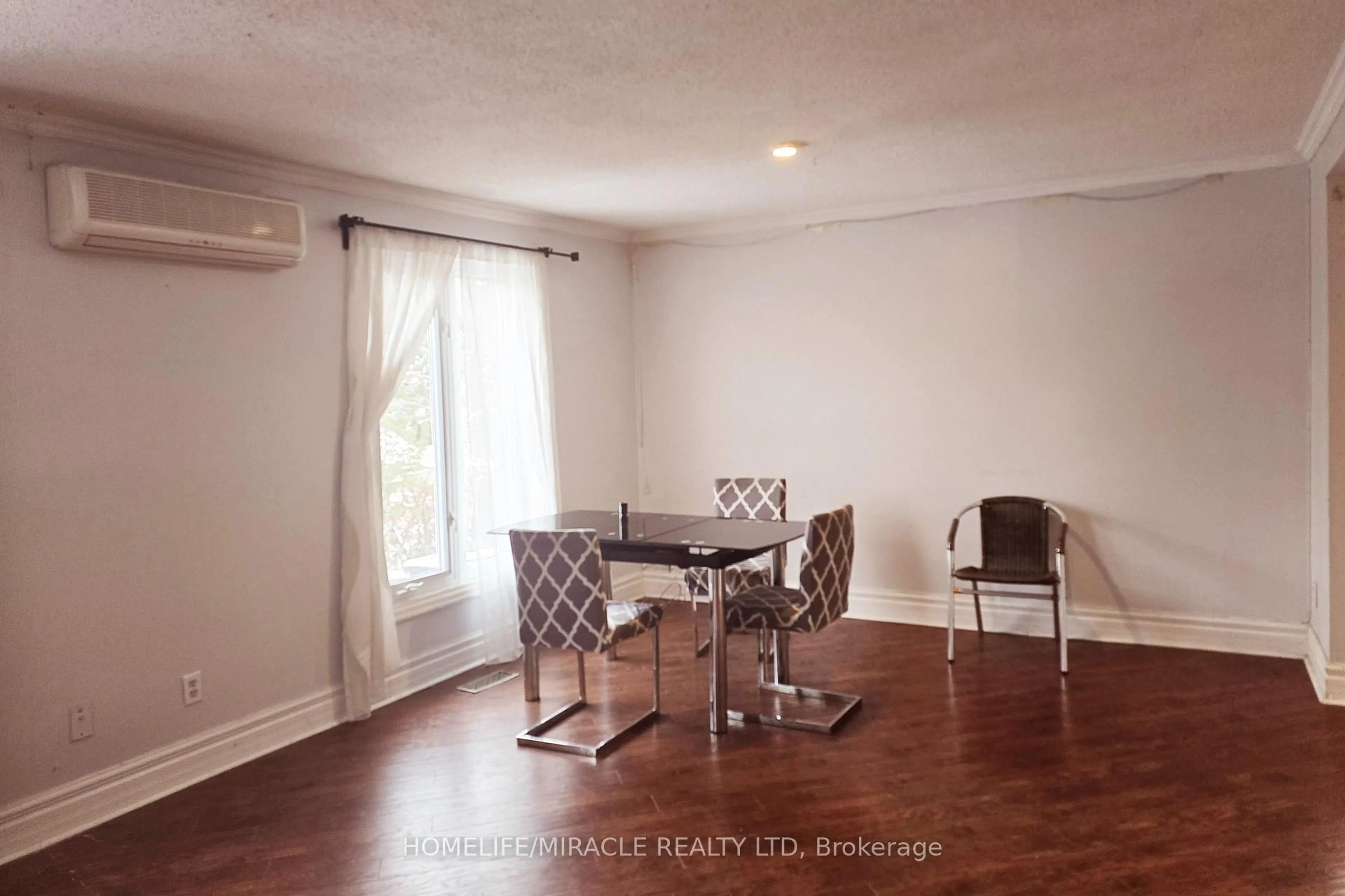 Dining room, wood/laminate floor for 115 Codsell Ave, Toronto Ontario M3H 3W3