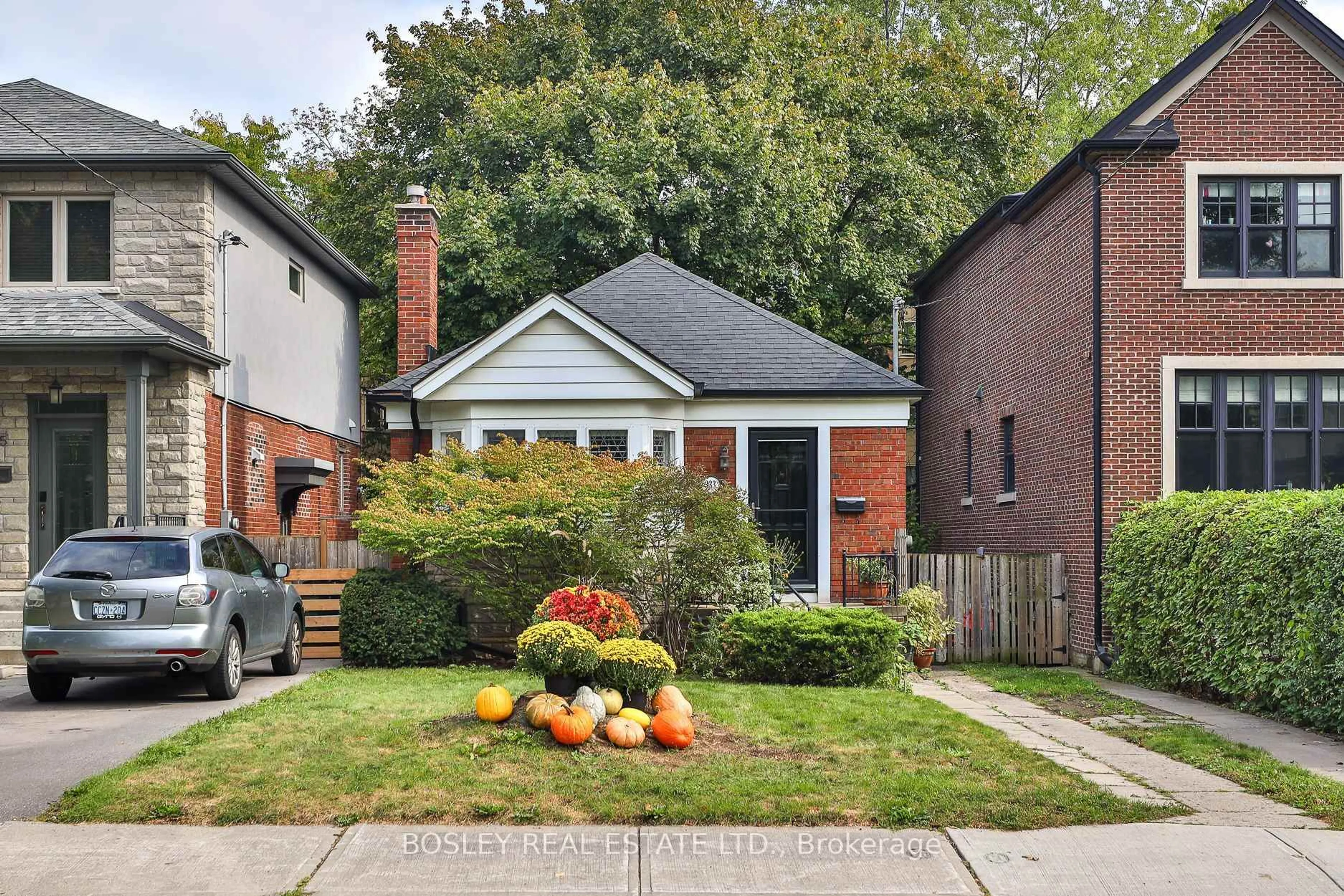 Home with brick exterior material, street for 333 Sutherland Dr, Toronto Ontario M4G 1J7