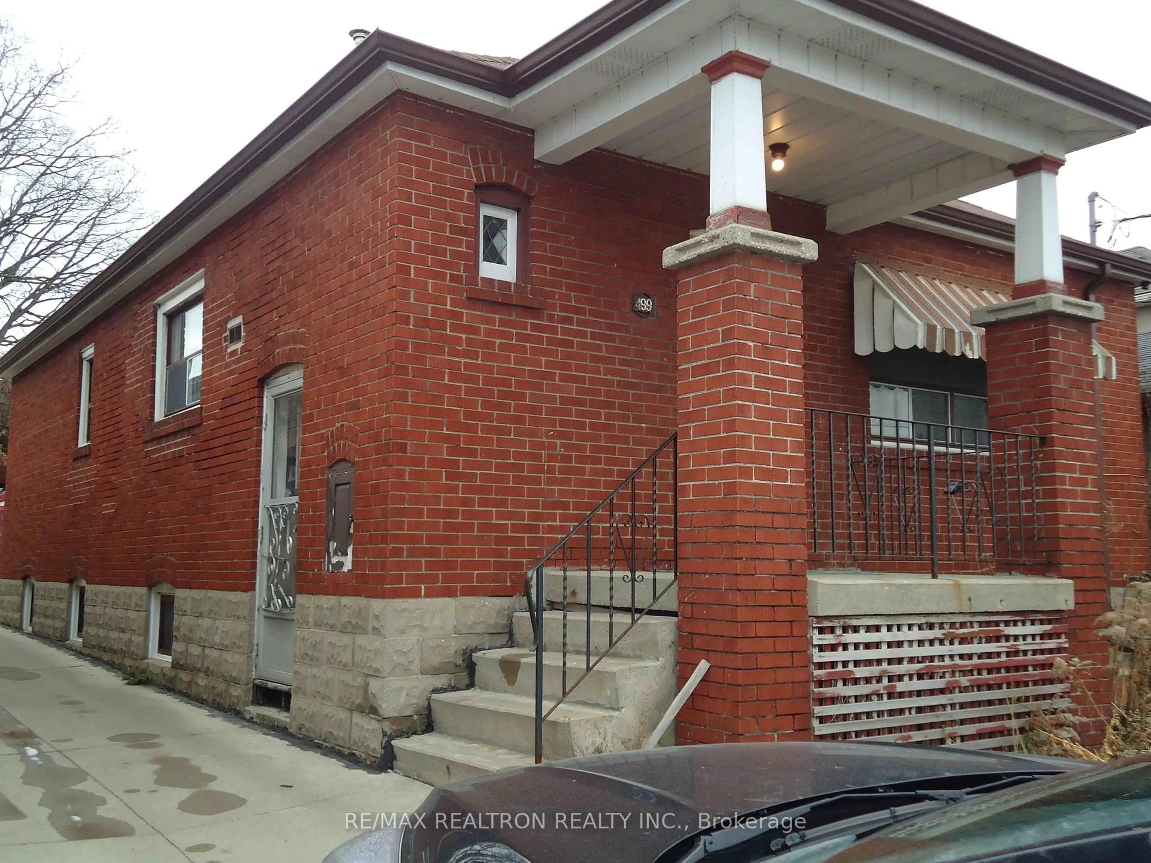 Home with brick exterior material, street for 499 Northcliffe Blvd, Toronto Ontario M6E 3L4