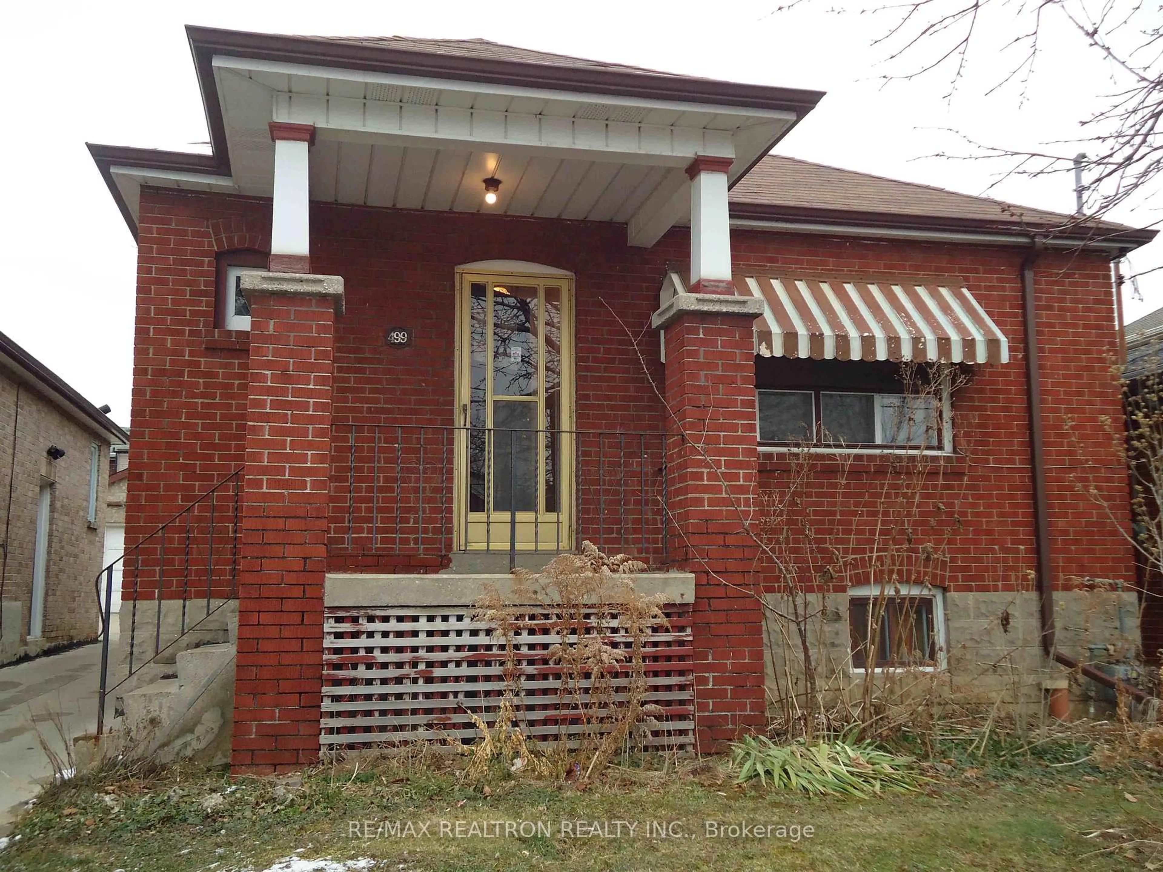 Home with brick exterior material, street for 499 Northcliffe Blvd, Toronto Ontario M6E 3L4