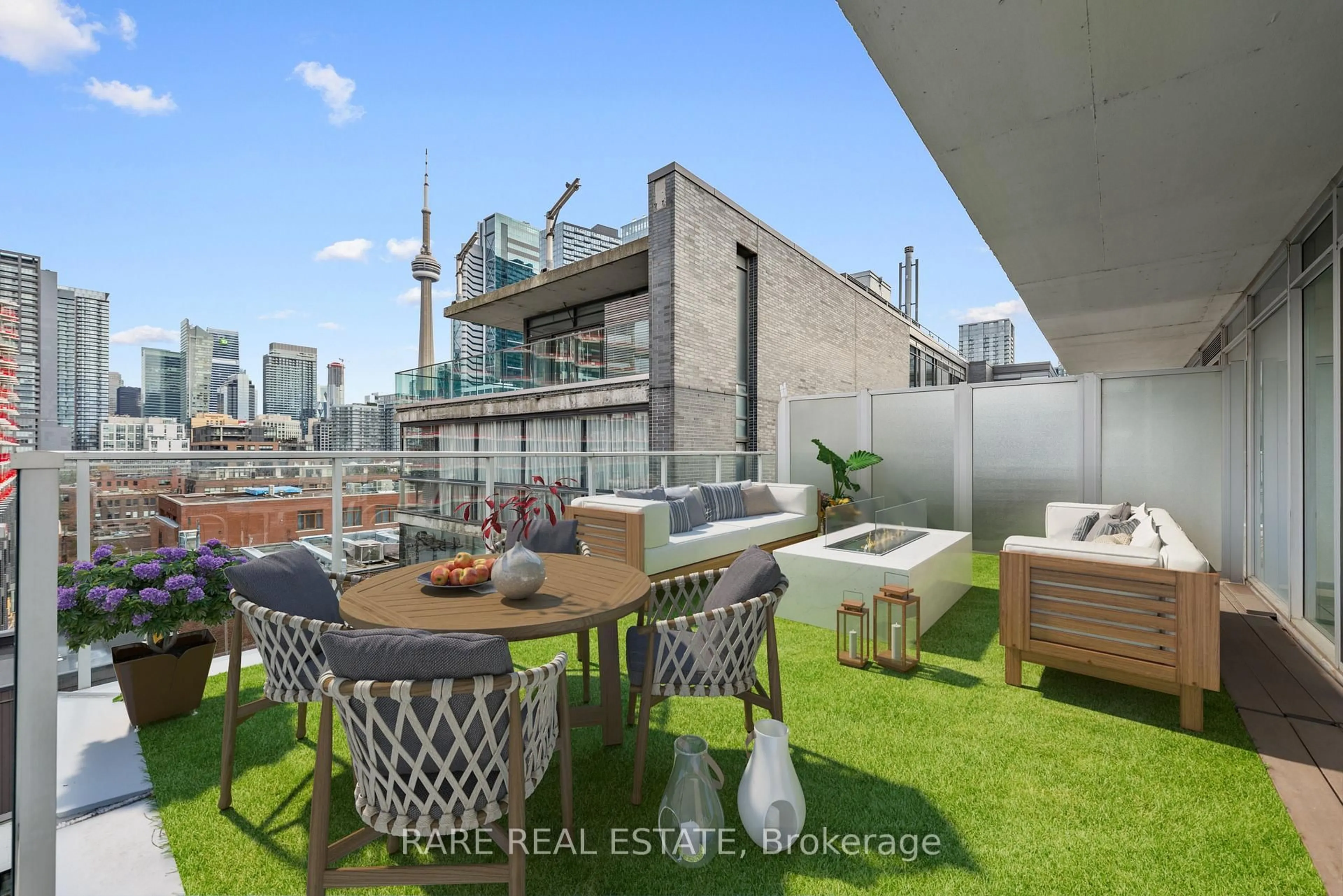 Patio, city buildings view from balcony for 75 Portland St #1008, Toronto Ontario M5V 2M9
