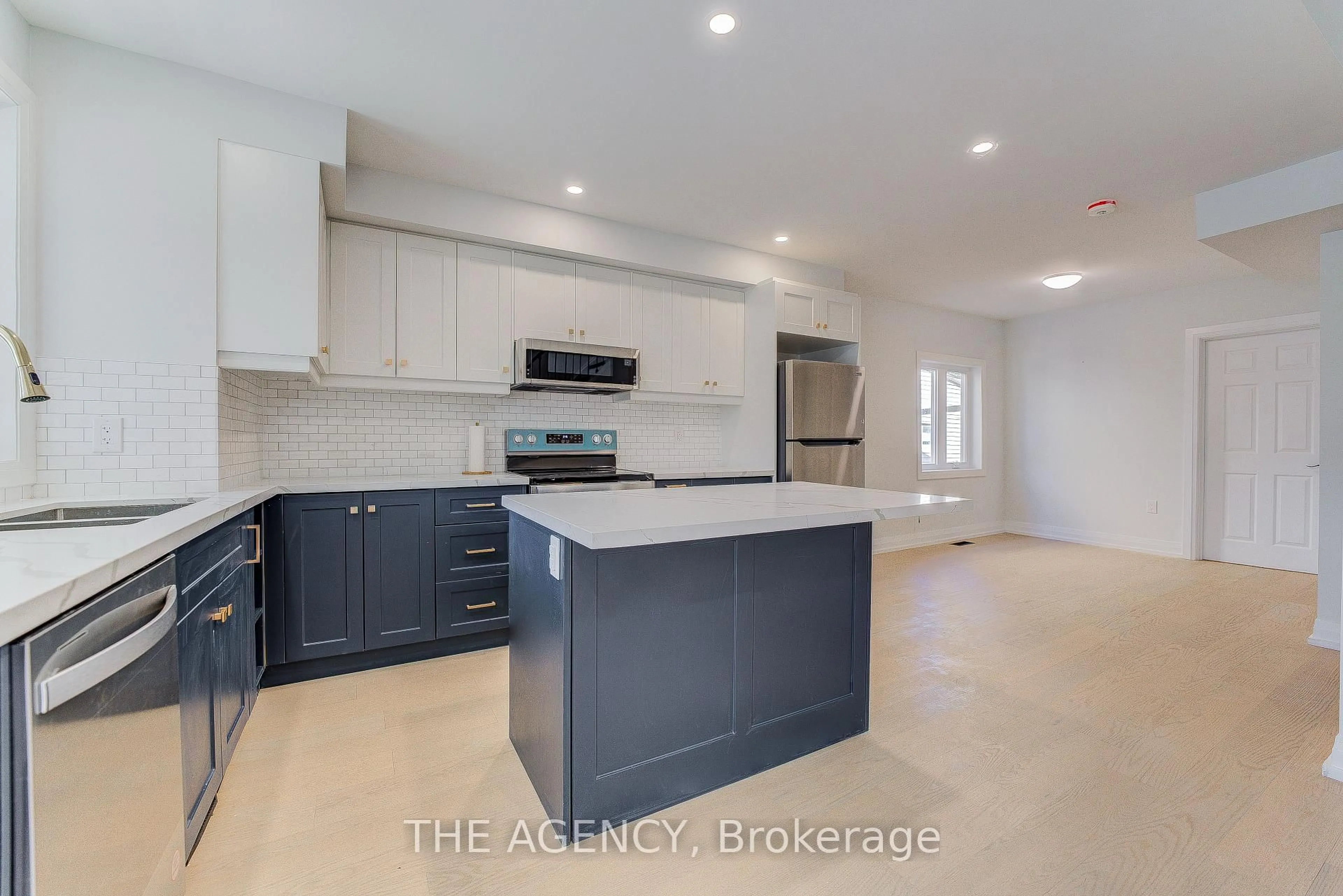 Open concept kitchen, ceramic/tile floor for 259 Robina Ave, Toronto Ontario M6C 3Y9