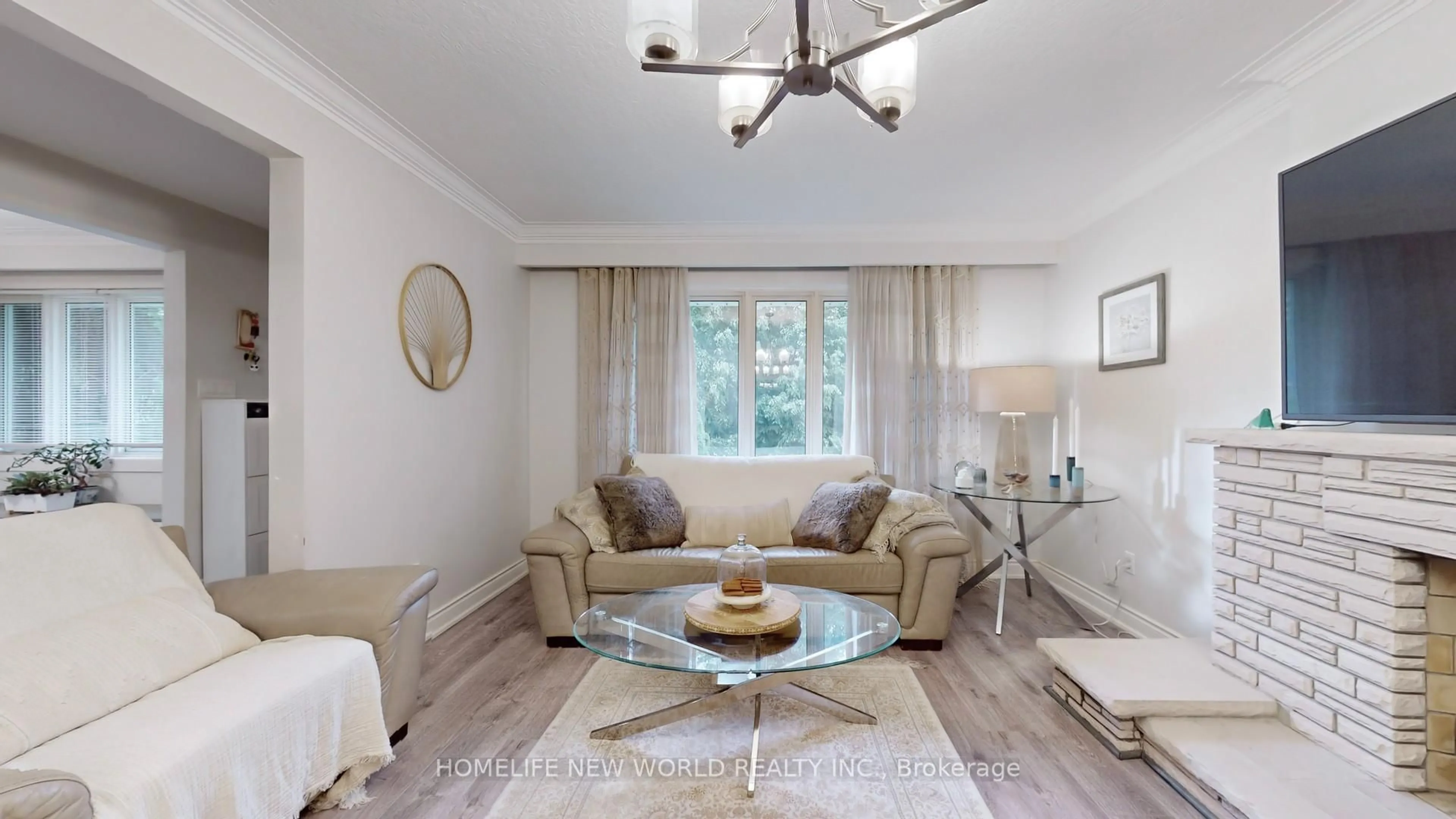 Living room with furniture, wood/laminate floor for 11 Elynhill Dr, Toronto Ontario M2R 1C5