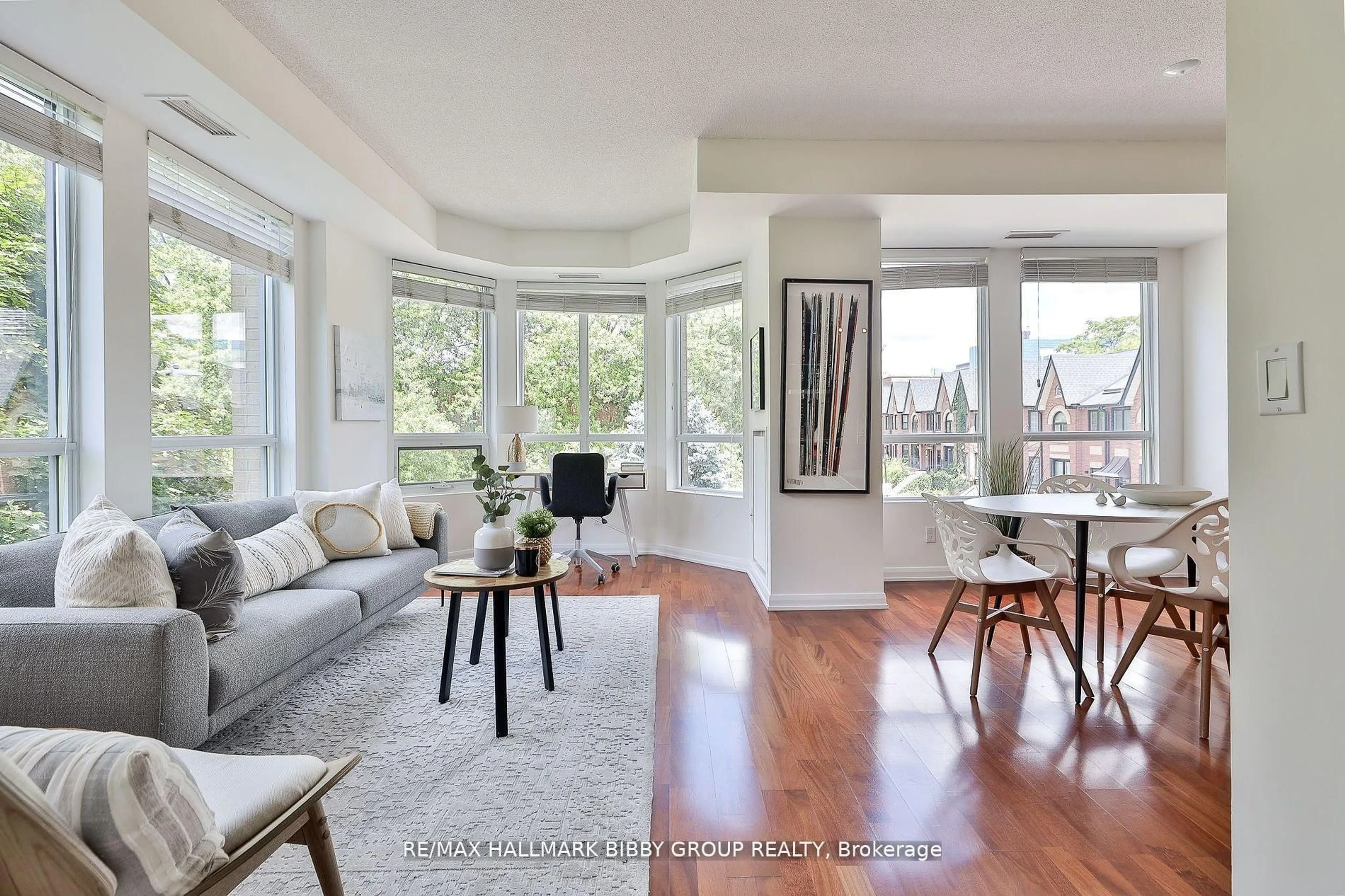 Living room with furniture, wood/laminate floor for 25 Soho St #P302, Toronto Ontario M5T 3L8