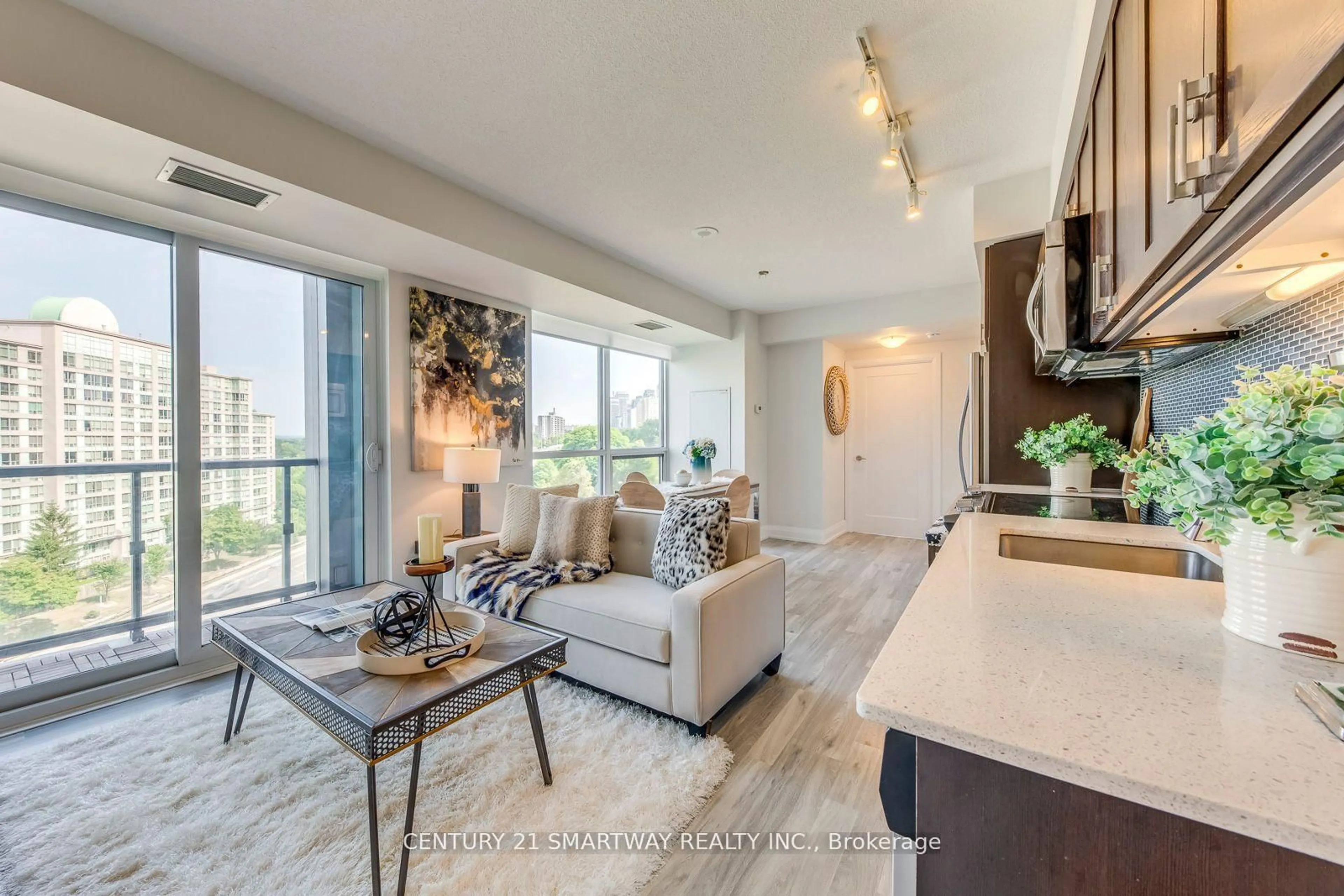 Living room with furniture, unknown for 18 Graydon Hall Dr #905, Toronto Ontario M3A 0A4