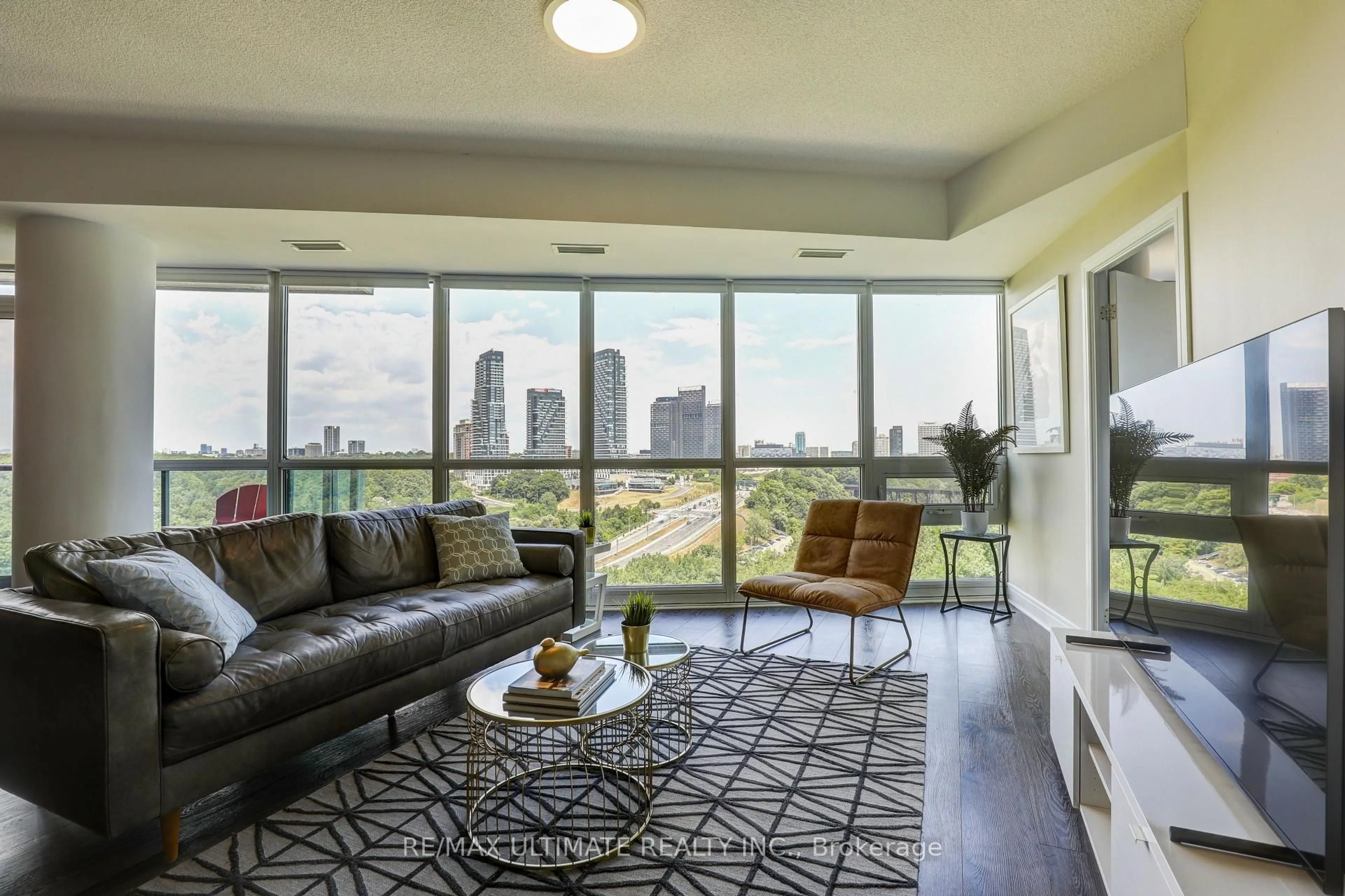 Living room with furniture, unknown for 35 Brian Peck Cres #807, Toronto Ontario M4G 0A5