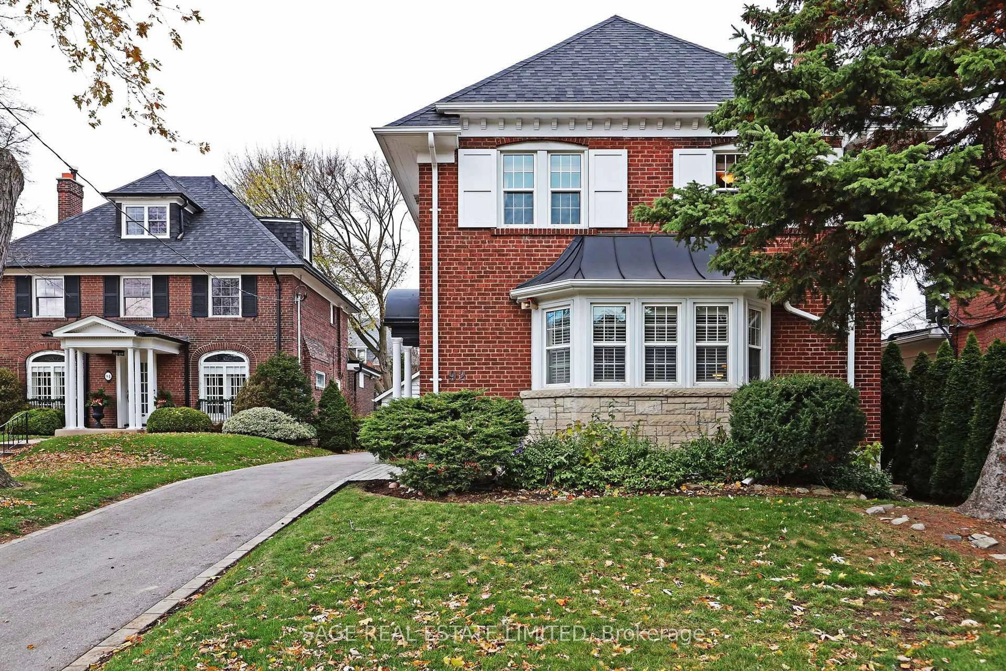 Home with brick exterior material, street for 92 Chatsworth Dr, Toronto Ontario M4R 1R7