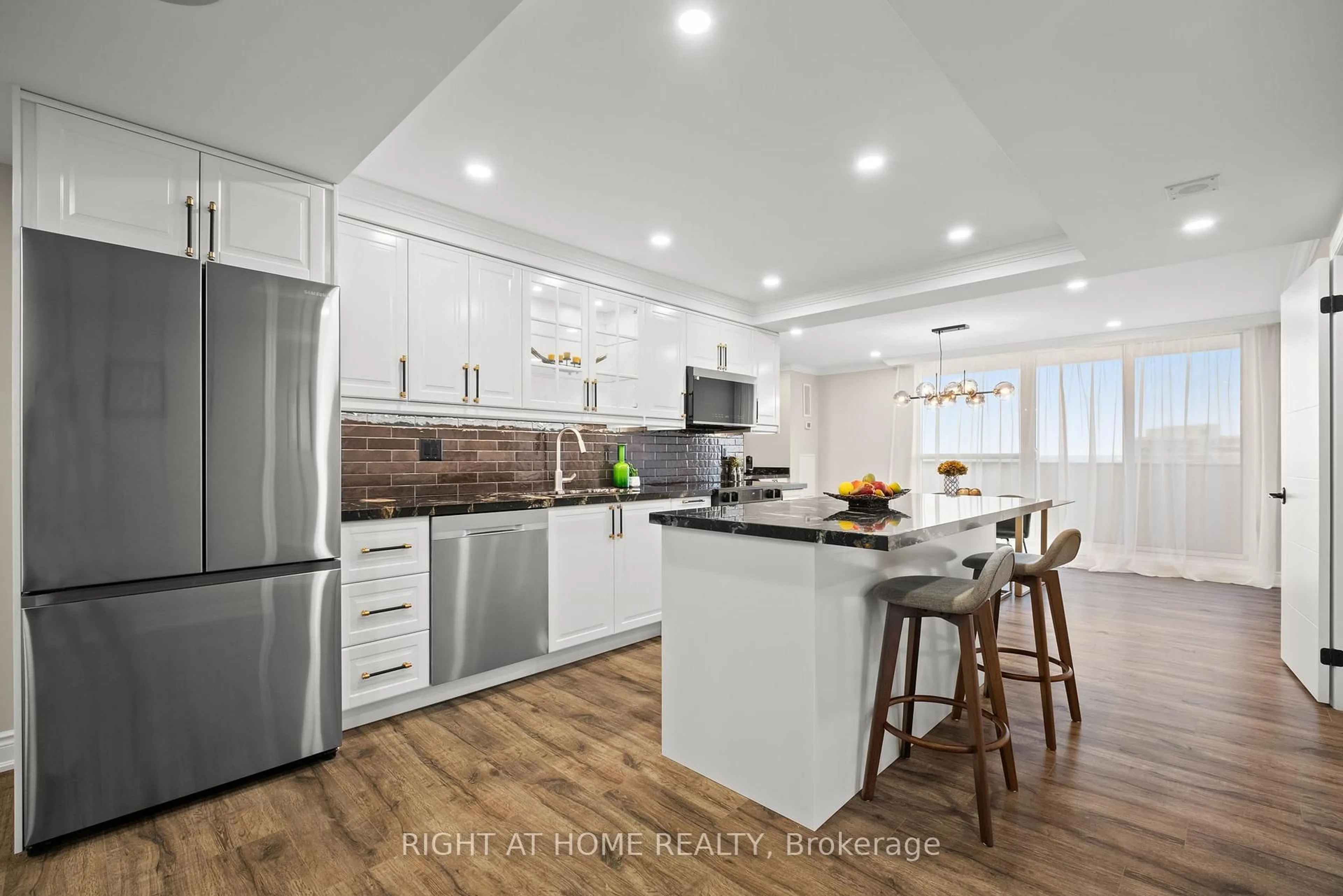 Open concept kitchen, wood/laminate floor for 3303 Don Mills Rd #2903, Toronto Ontario M2J 4T6