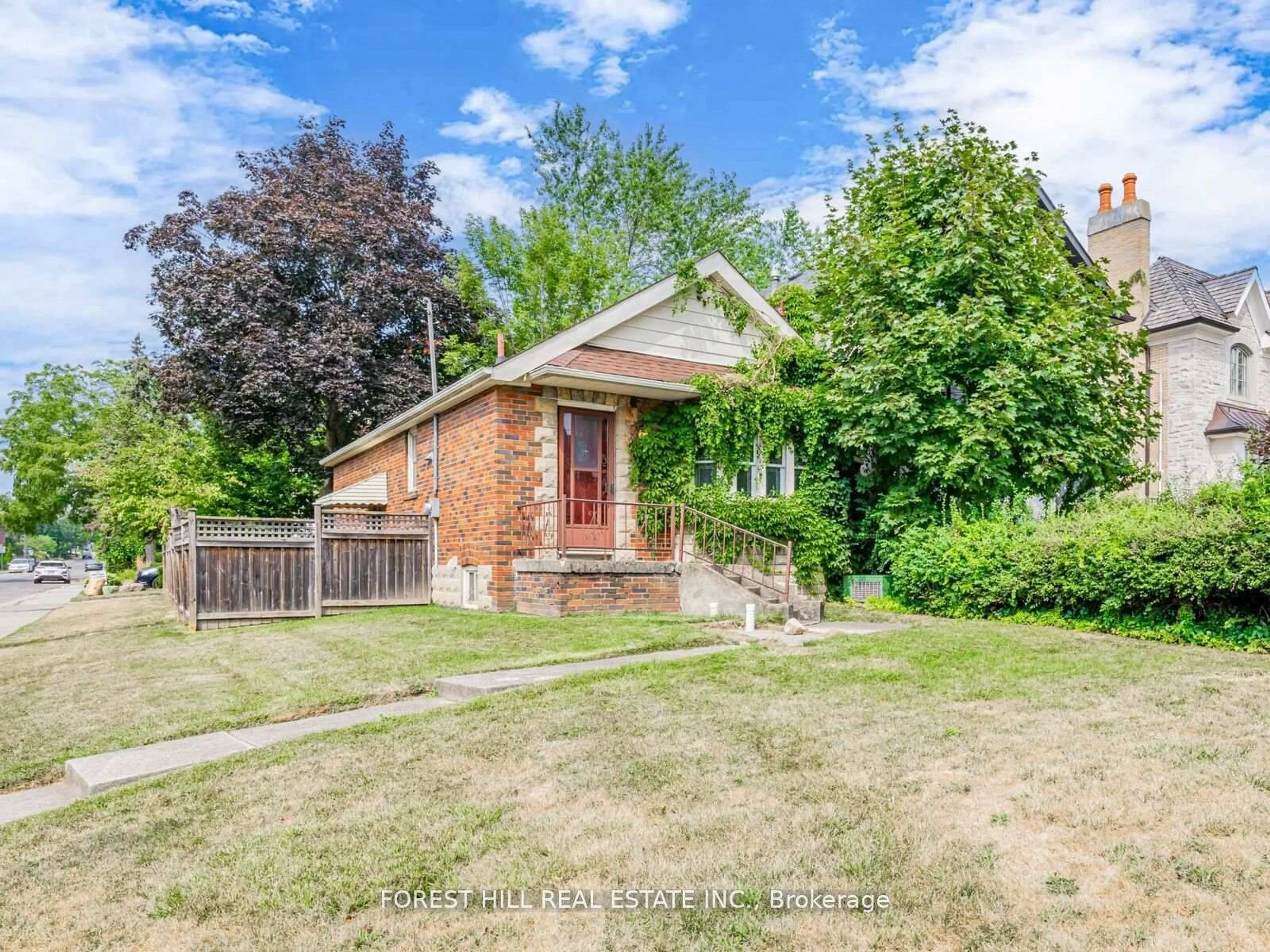 Home with brick exterior material, street for 2 Esgore Dr, Toronto Ontario M5M 3R1