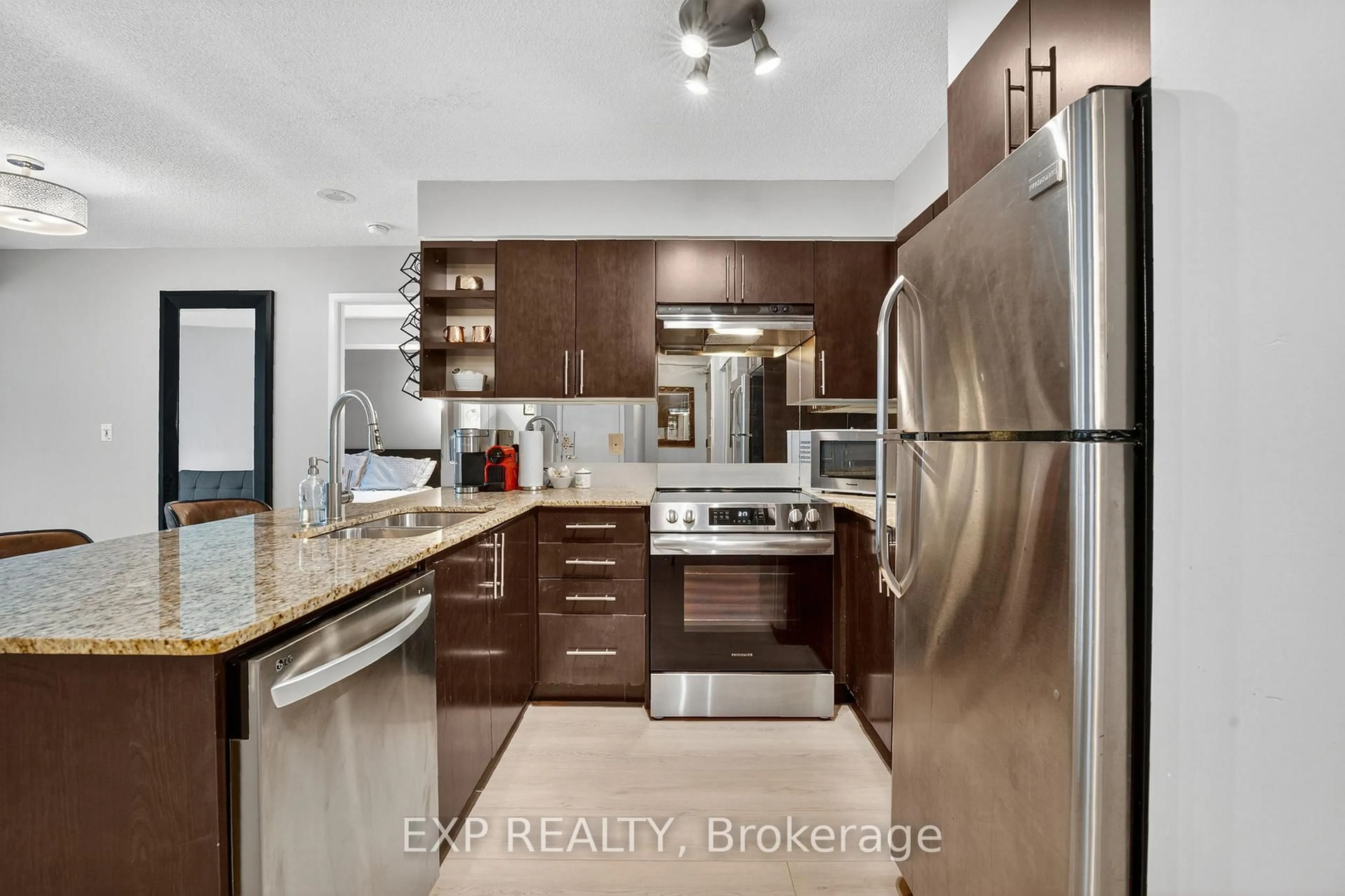 Open concept kitchen, ceramic/tile floor for 96 St Patrick St #409, Toronto Ontario M5T 1V2