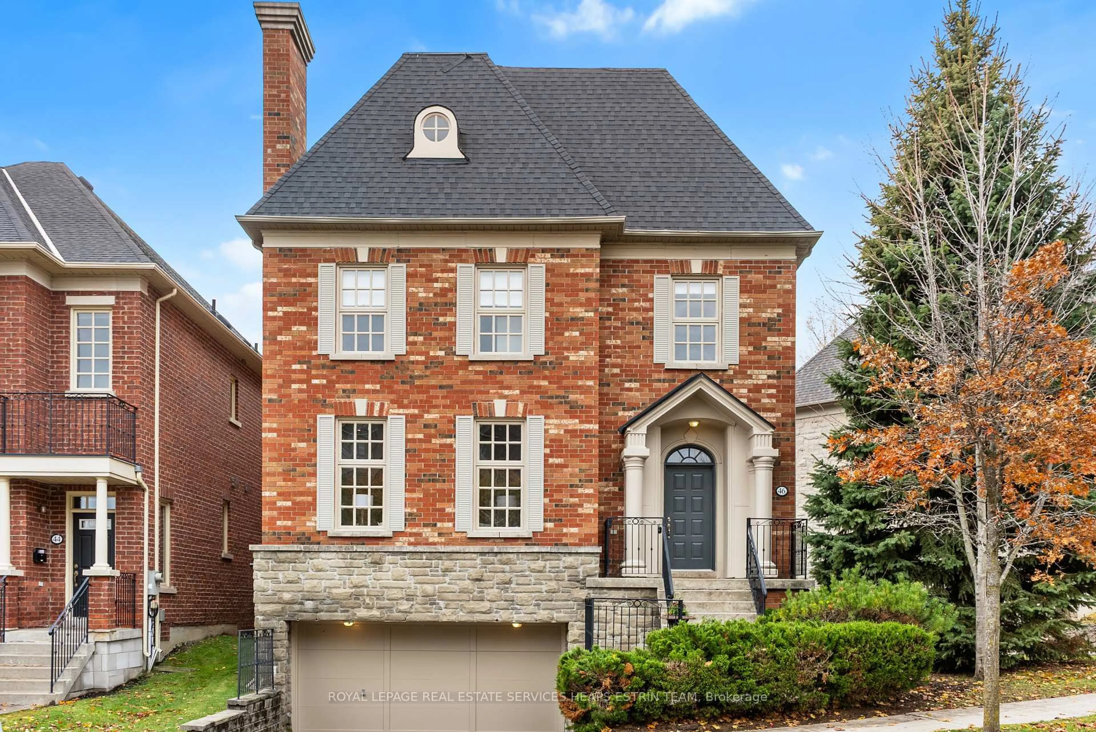 Home with brick exterior material, street for 46 True Davidson Dr, Toronto Ontario M4W 3X5