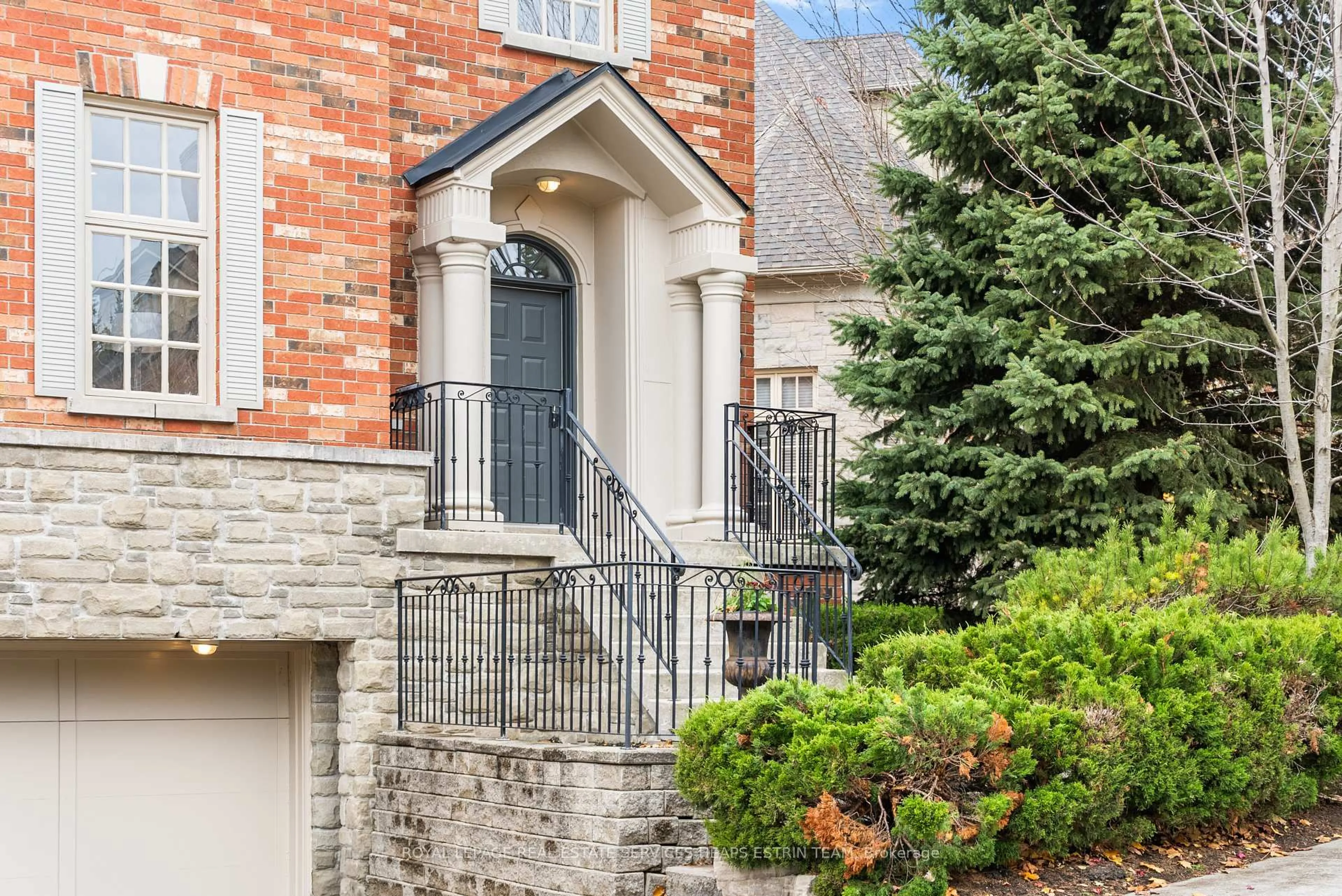 Home with brick exterior material, street for 46 True Davidson Dr, Toronto Ontario M4W 3X5