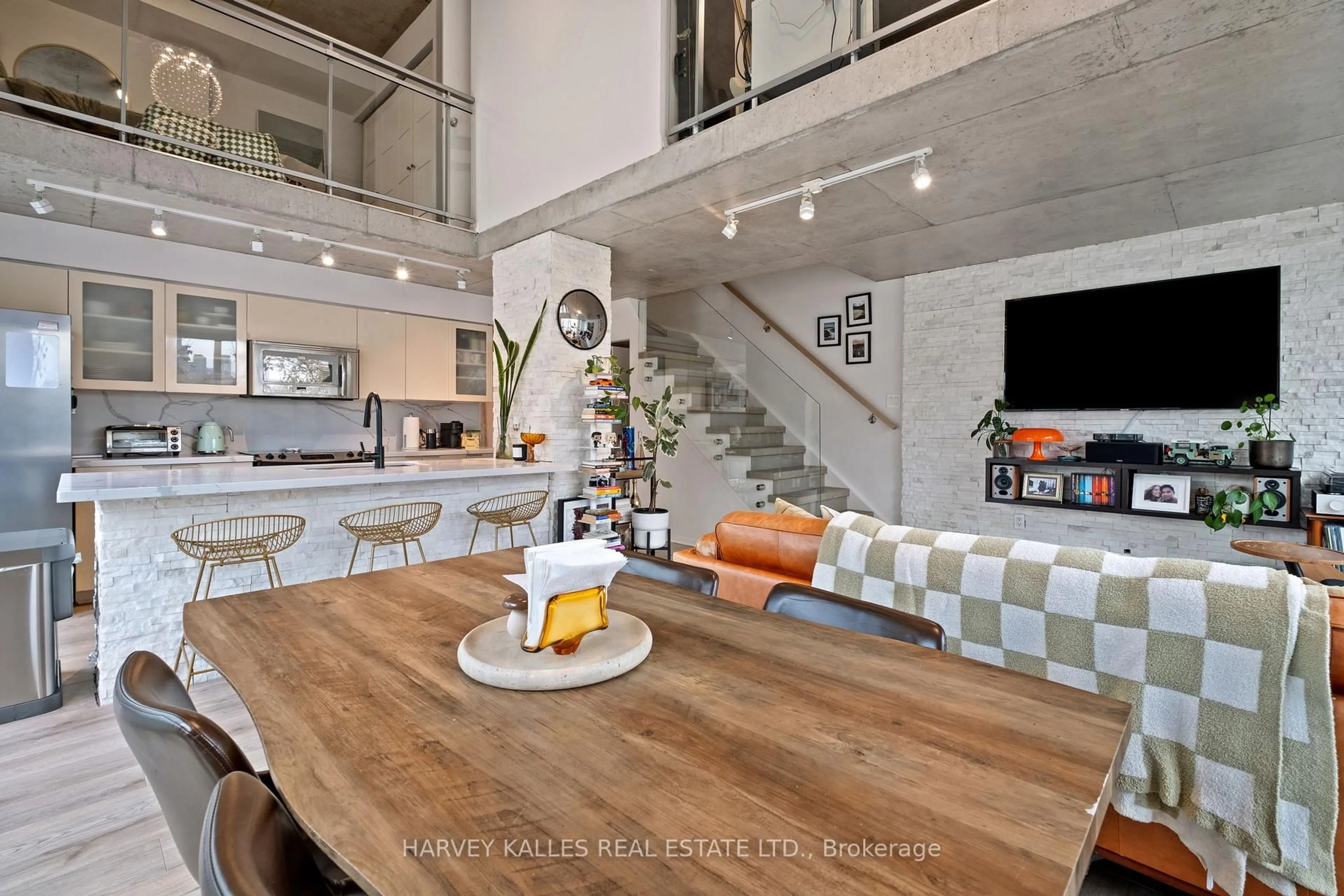 Open concept kitchen, cement floor for 954 King St #314, Toronto Ontario M6K 3L9