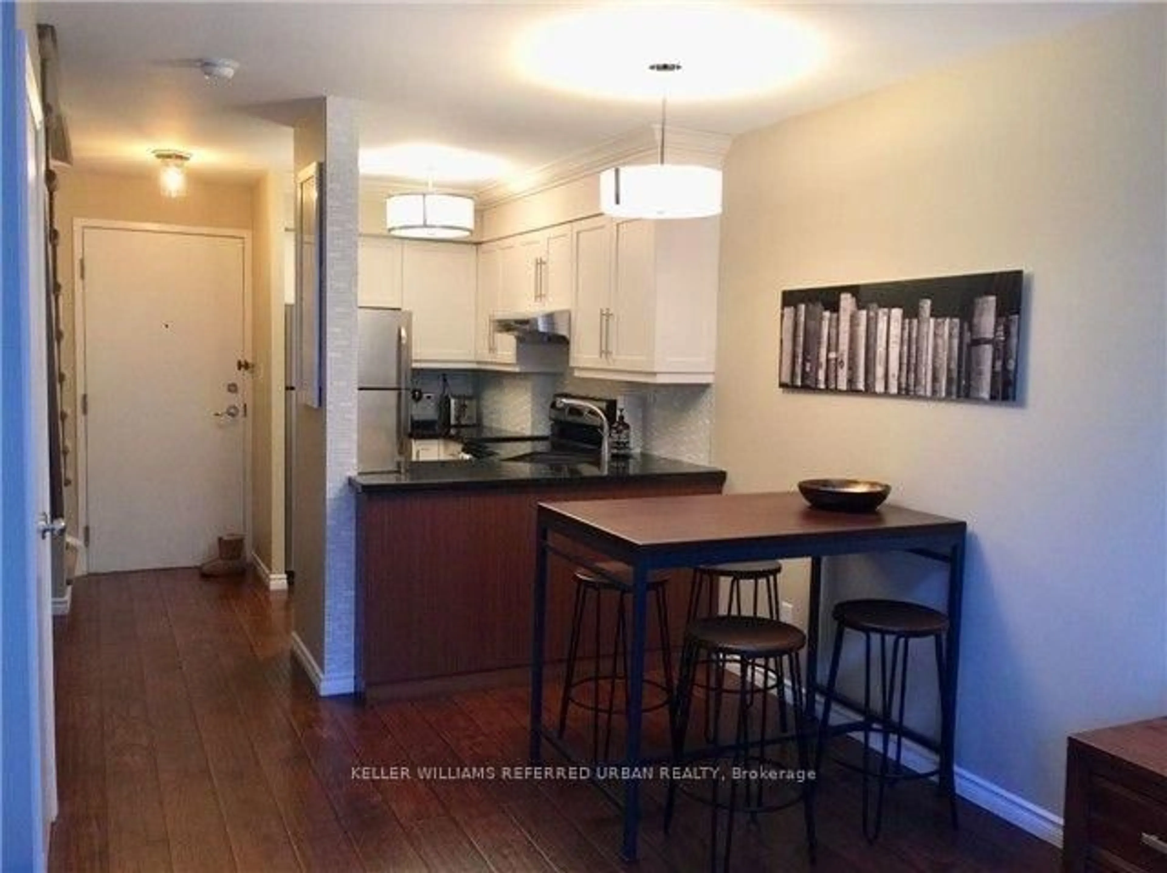 Open concept kitchen, wood/laminate floor for 1029 King St #426, Toronto Ontario M6K 3M9