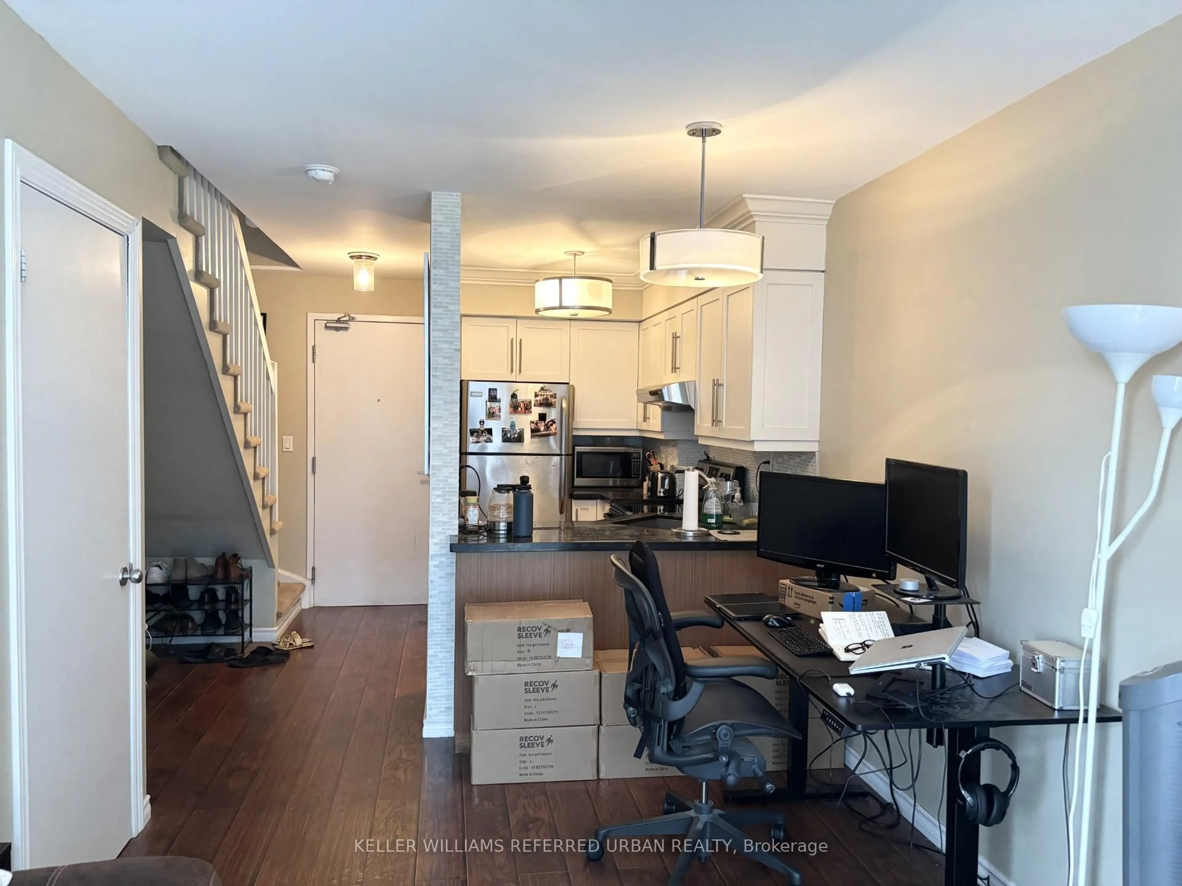 Open concept kitchen, wood/laminate floor for 1029 King St #426, Toronto Ontario M6K 3M9