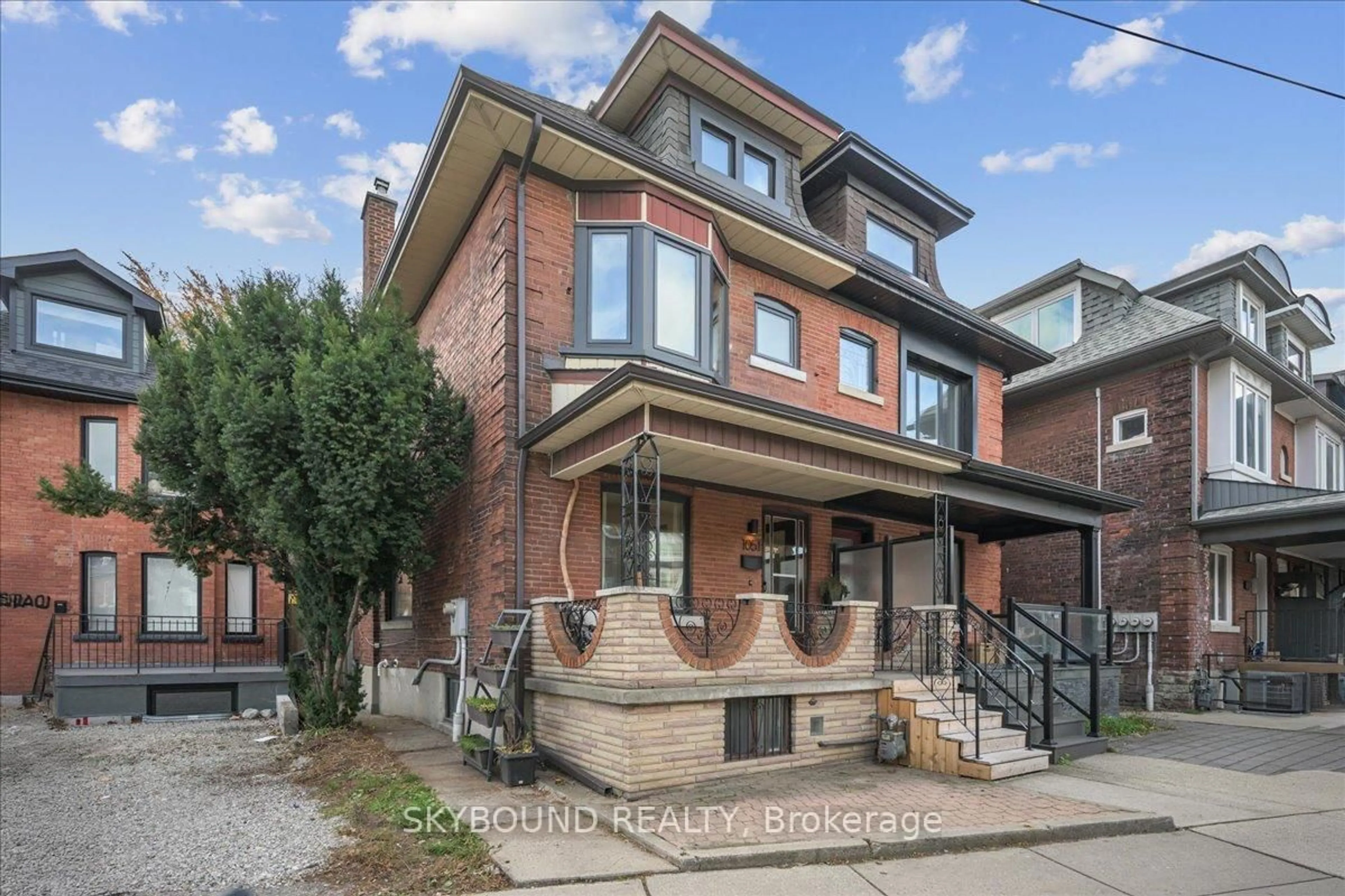 Home with brick exterior material, street for 1051 College St, Toronto Ontario M6H 1B1