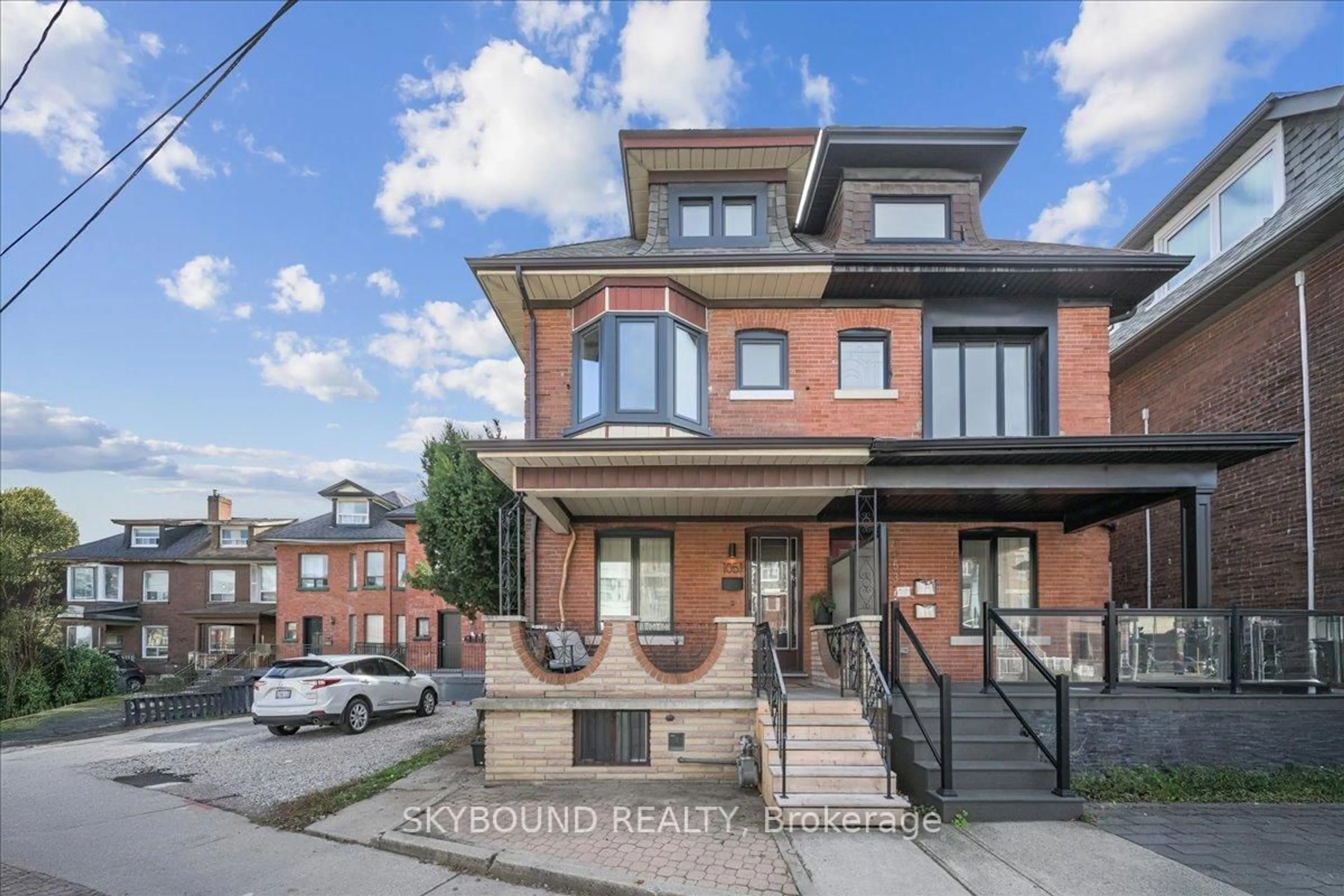 Home with brick exterior material, street for 1051 College St, Toronto Ontario M6H 1B1