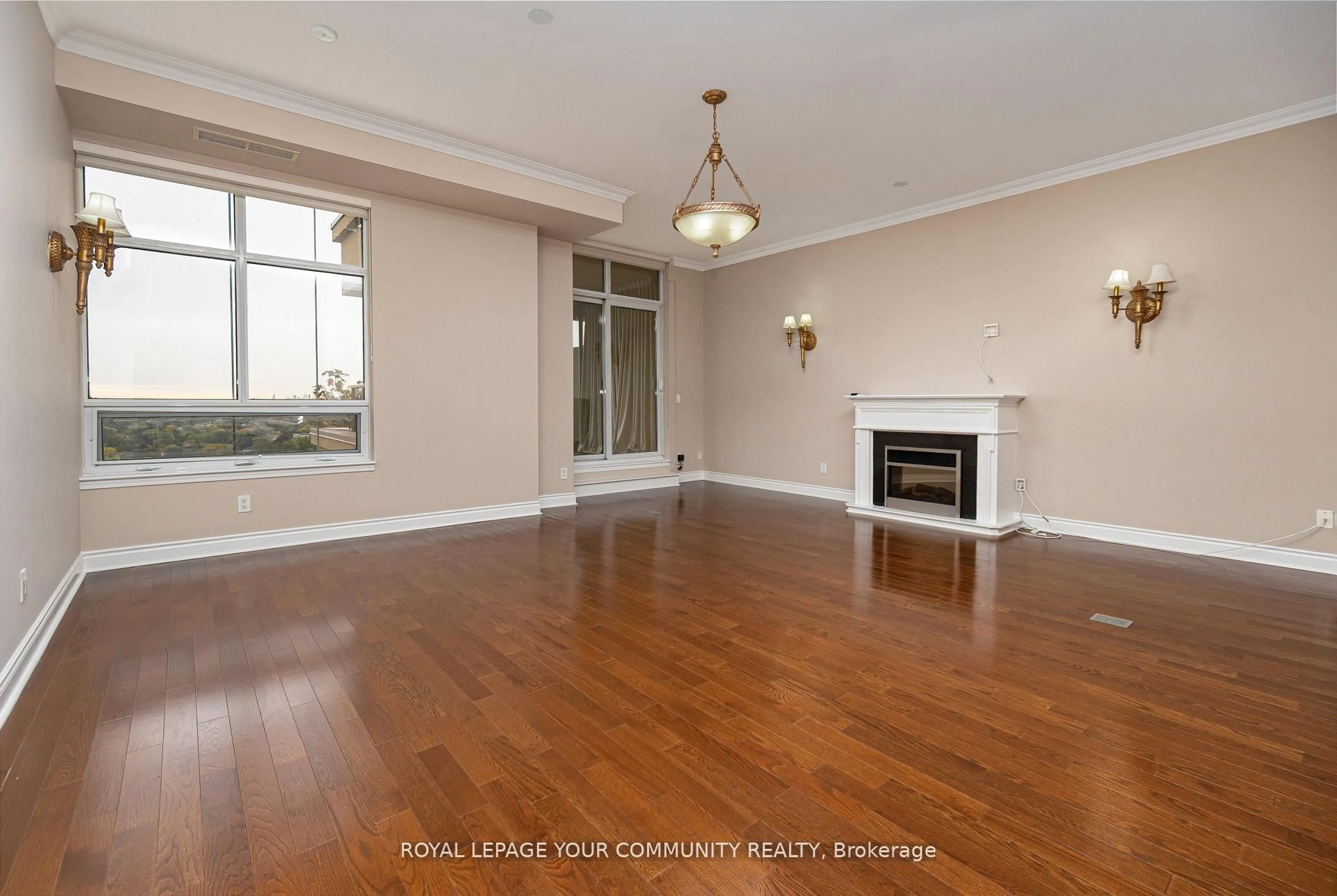 Living room with furniture, wood/laminate floor for 18 Kenaston Gdns #1906, Toronto Ontario M2K 3C7