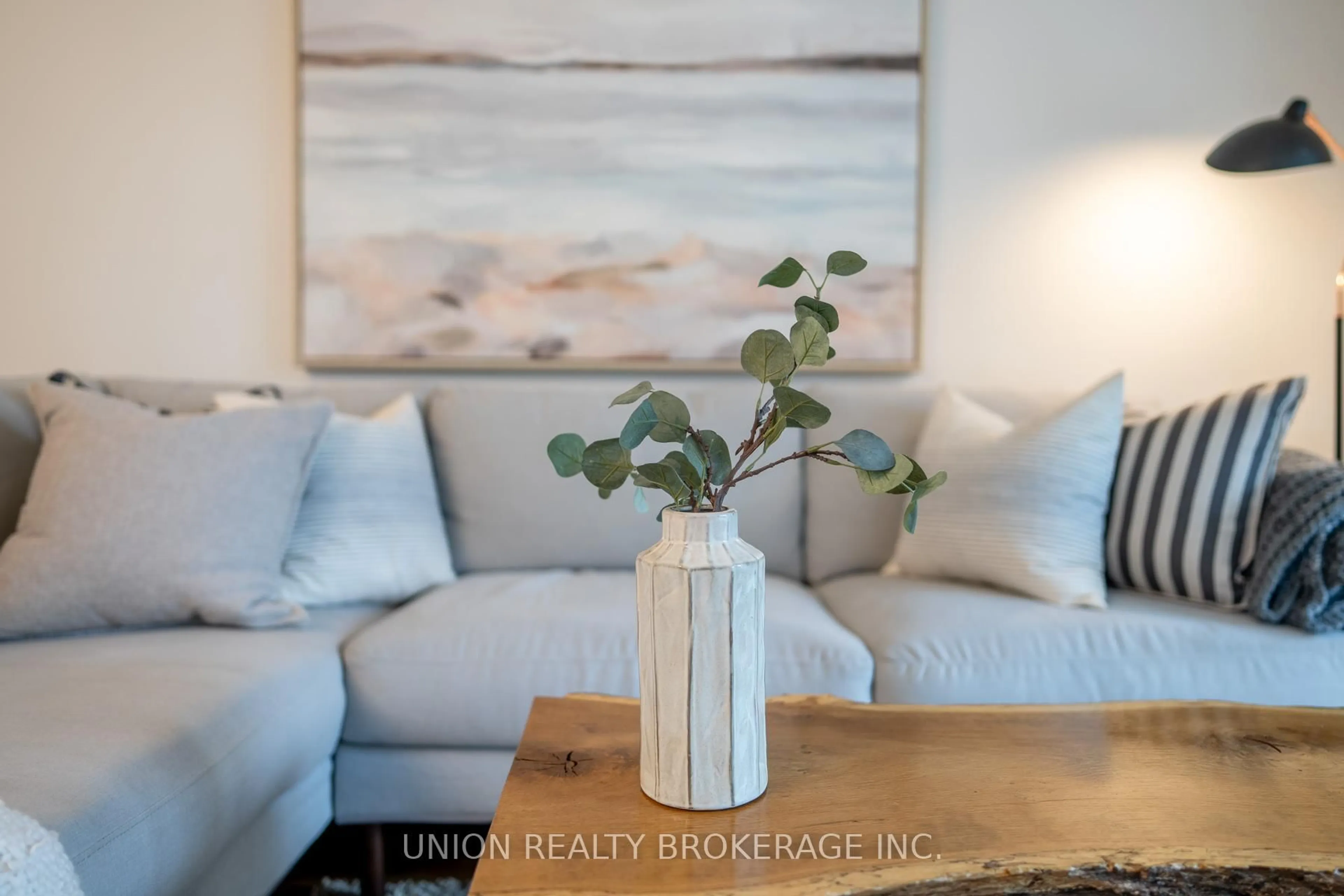 Living room with furniture, wood/laminate floor for 18 Stafford St #313, Toronto Ontario M5V 3W4