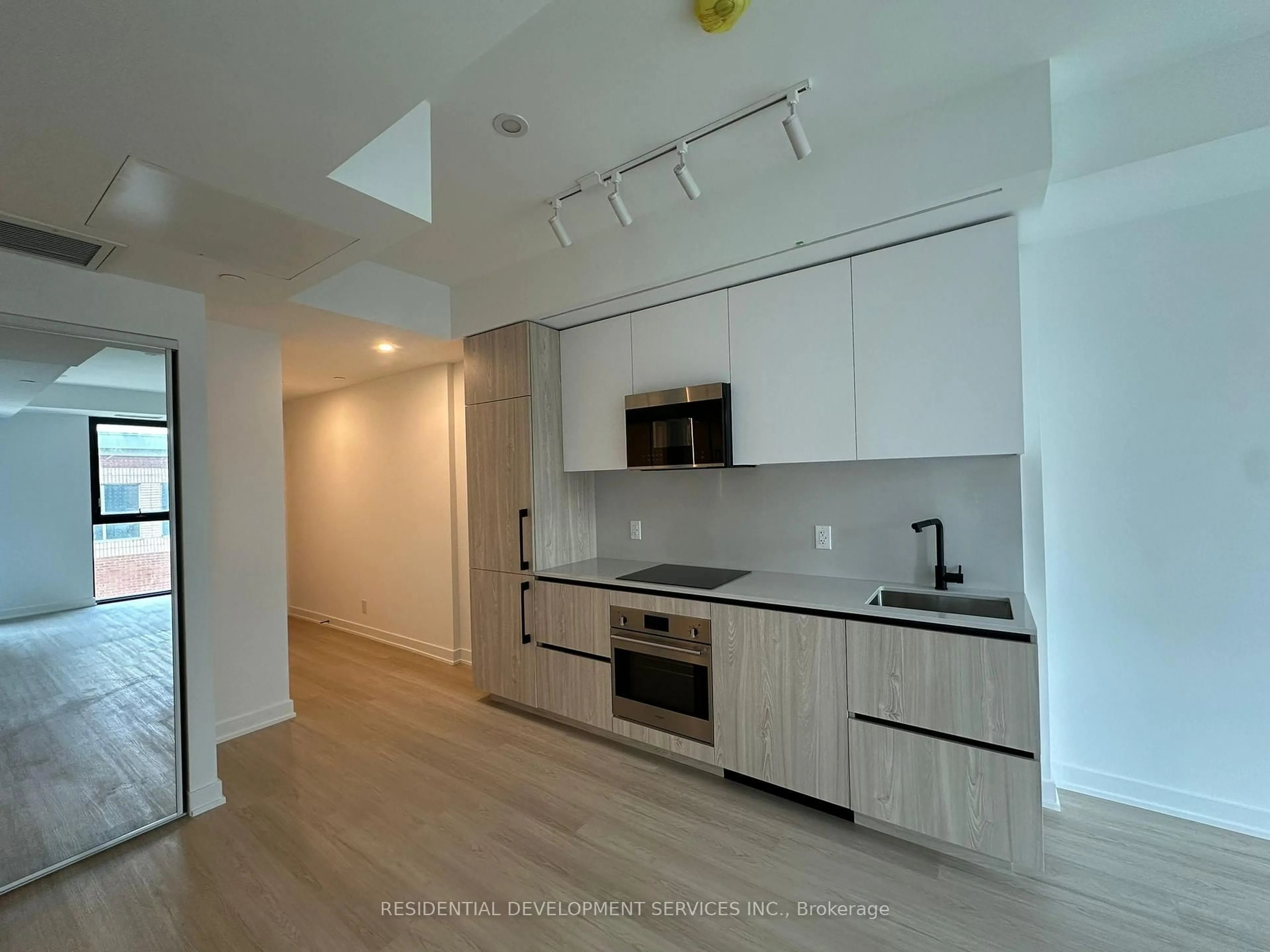 Open concept kitchen, unknown for 699 Sheppard Ave #306, Toronto Ontario M2K 0J5