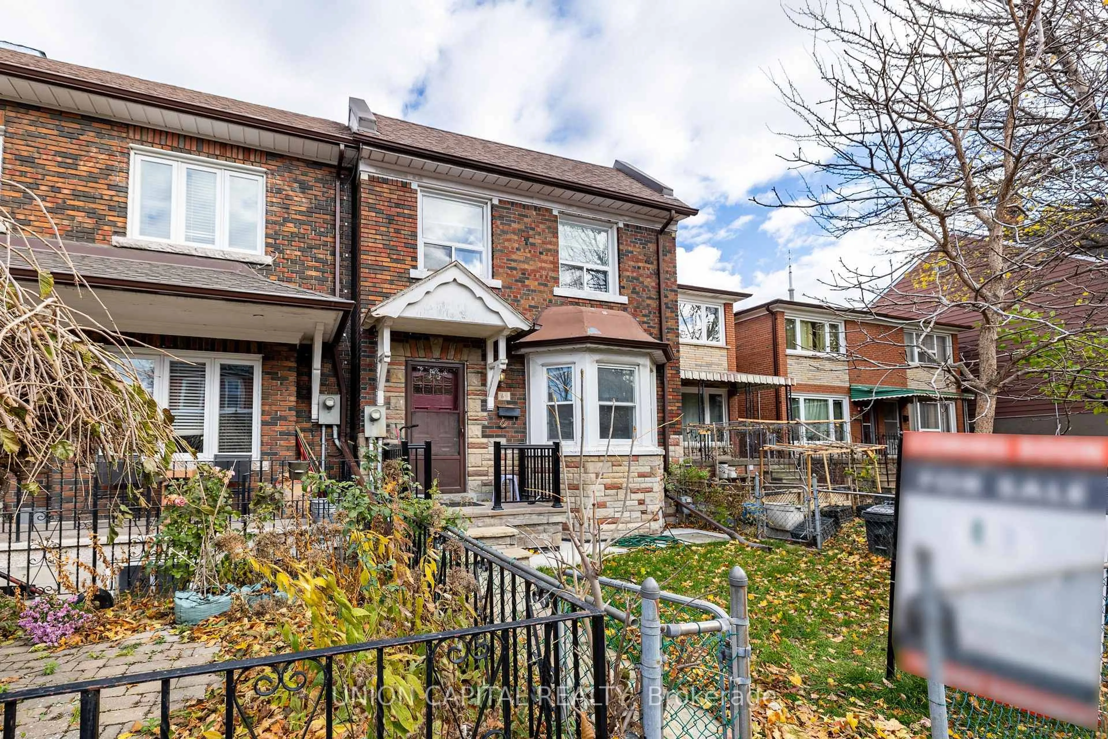 Home with brick exterior material, street for 69 DENISON Ave, Toronto Ontario M5T 2M7