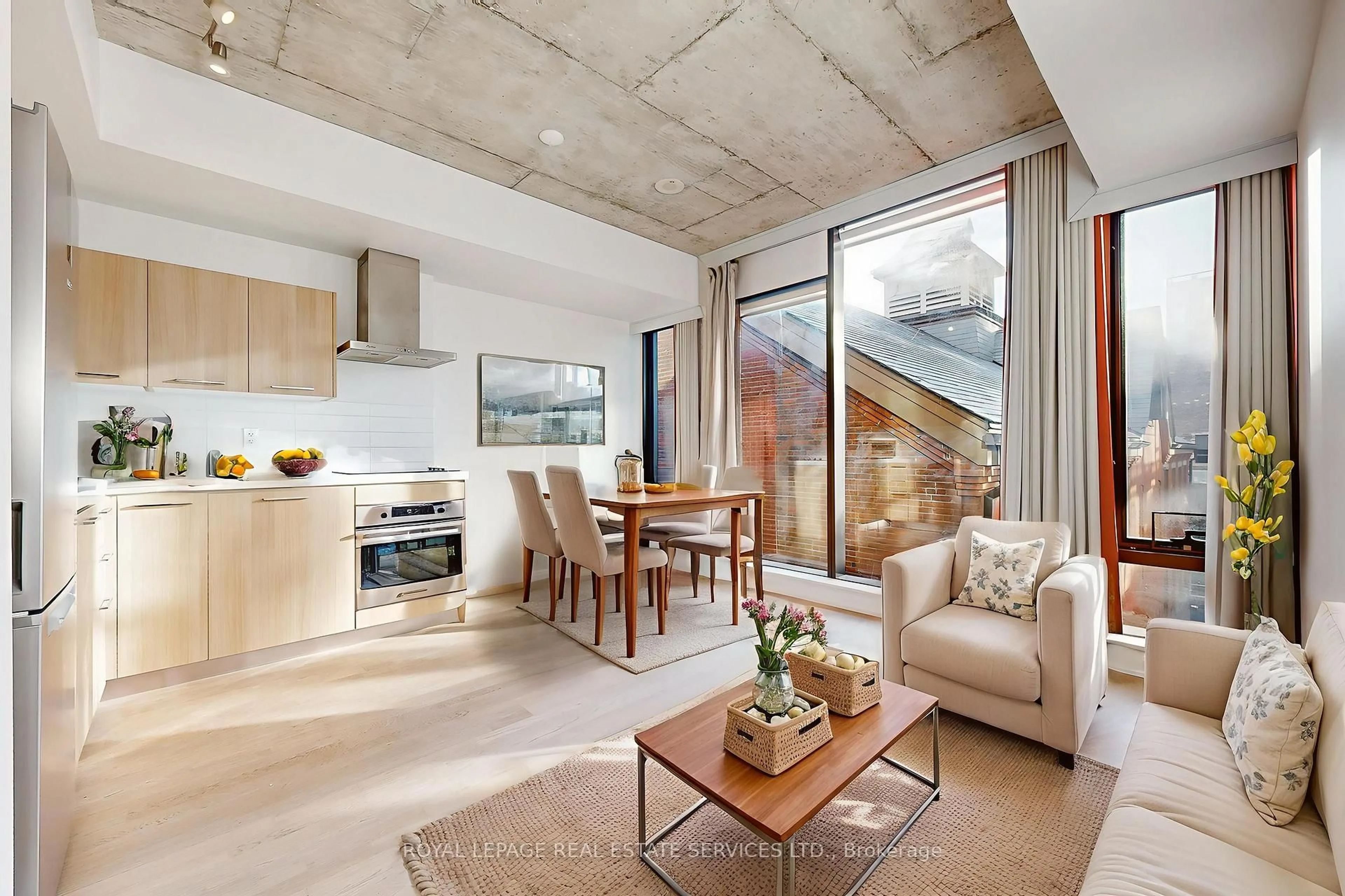 Open concept kitchen, cement floor for 560 King St #417, Toronto Ontario M5V 1M3