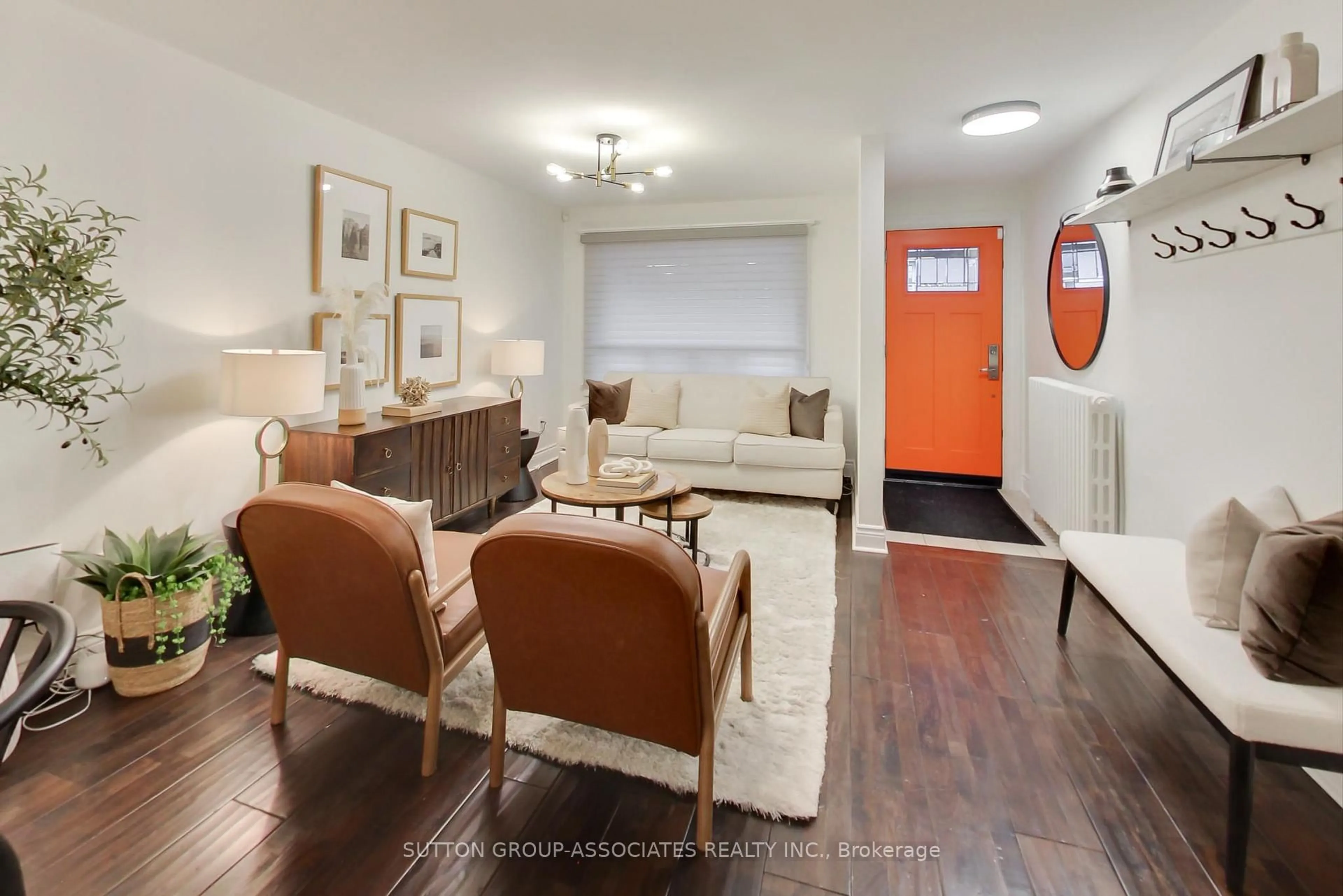 Living room with furniture, wood/laminate floor for 315 Atlas Ave, Toronto Ontario M6C 3P8