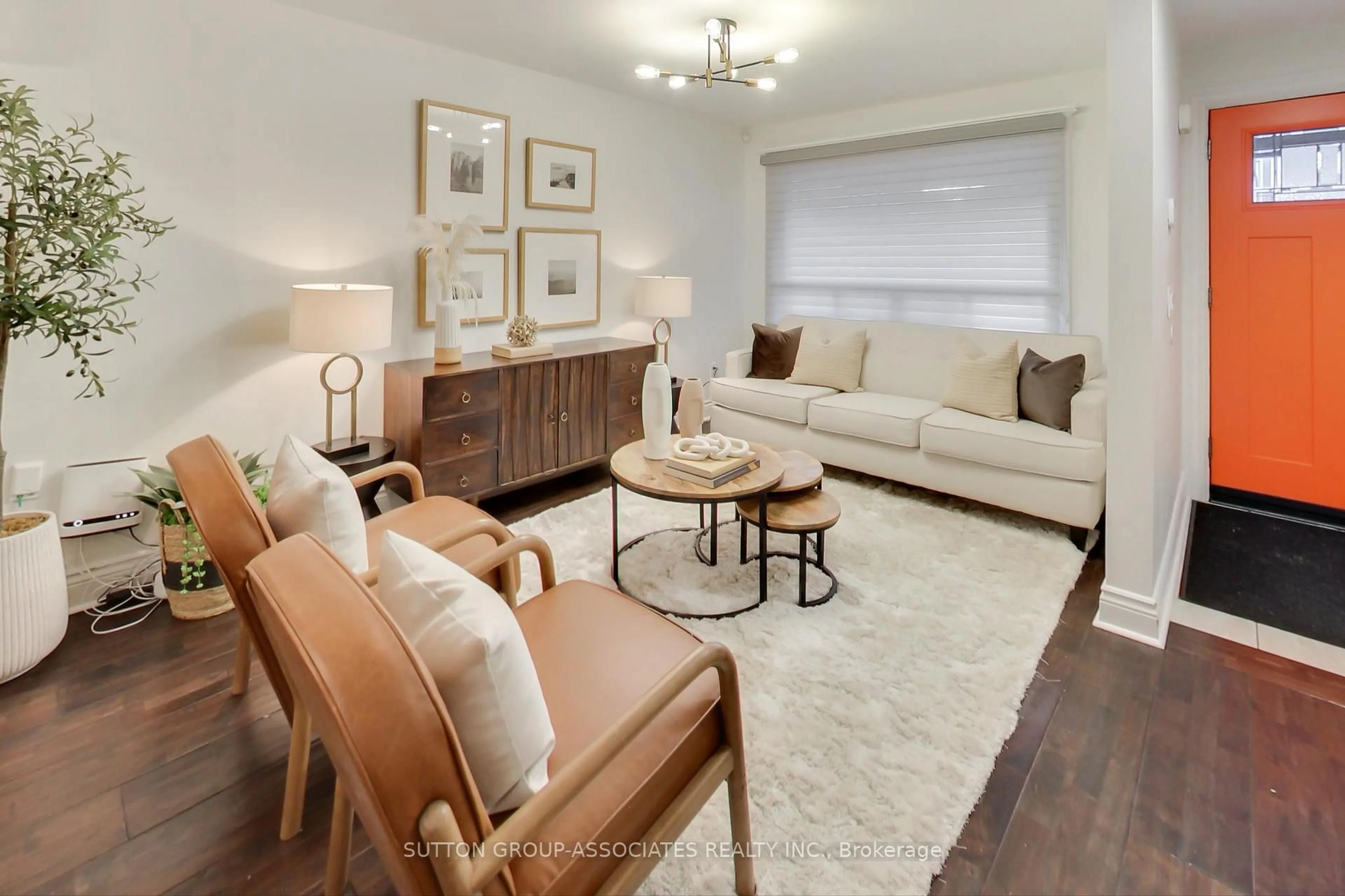 Living room with furniture, wood/laminate floor for 315 Atlas Ave, Toronto Ontario M6C 3P8