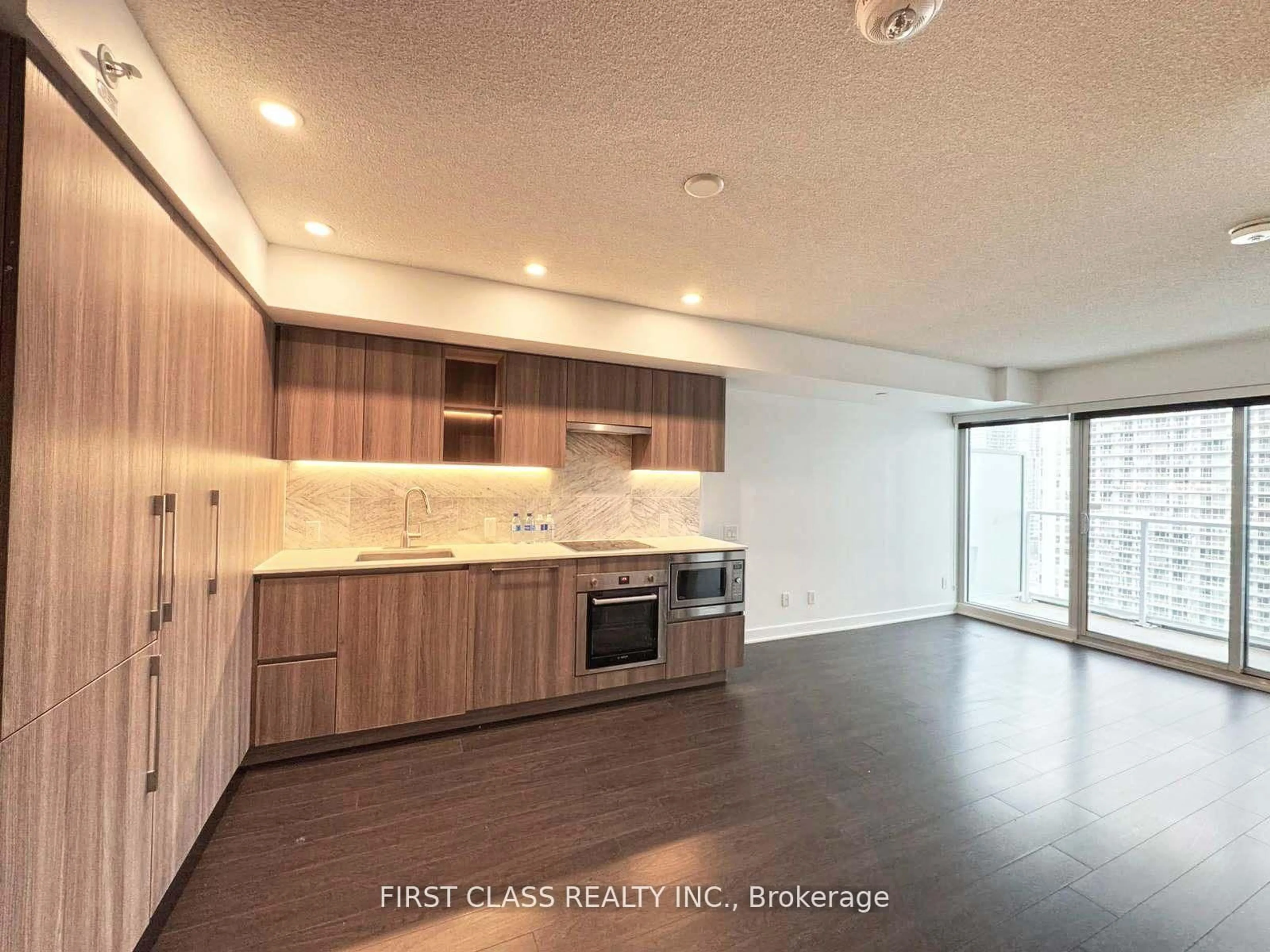 Open concept kitchen, wood/laminate floor for 19 Bathurst St St #2008, Toronto Ontario M5V 0N2