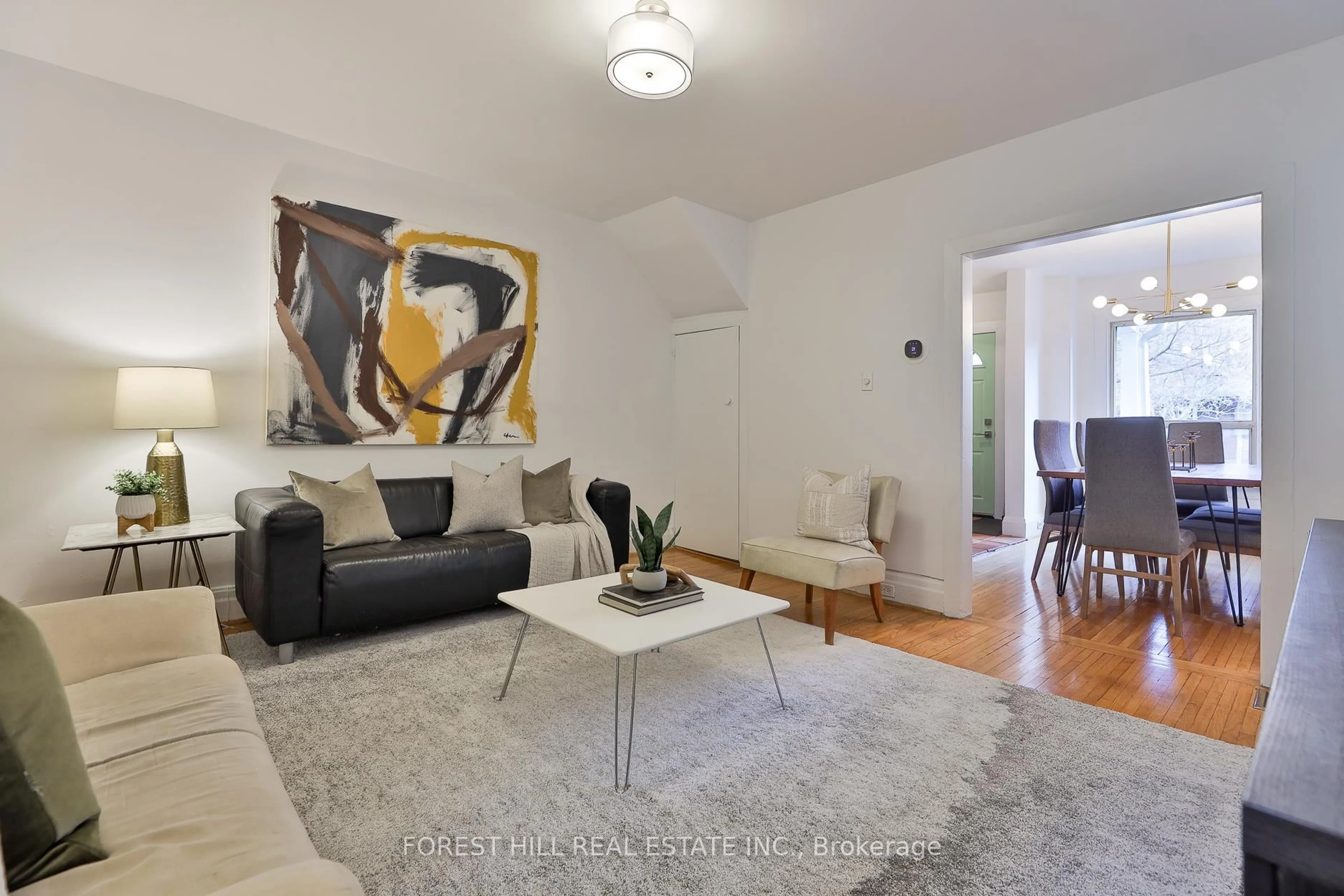 Living room with furniture, unknown for 68 Kenwood Ave, Toronto Ontario M6C 2S2