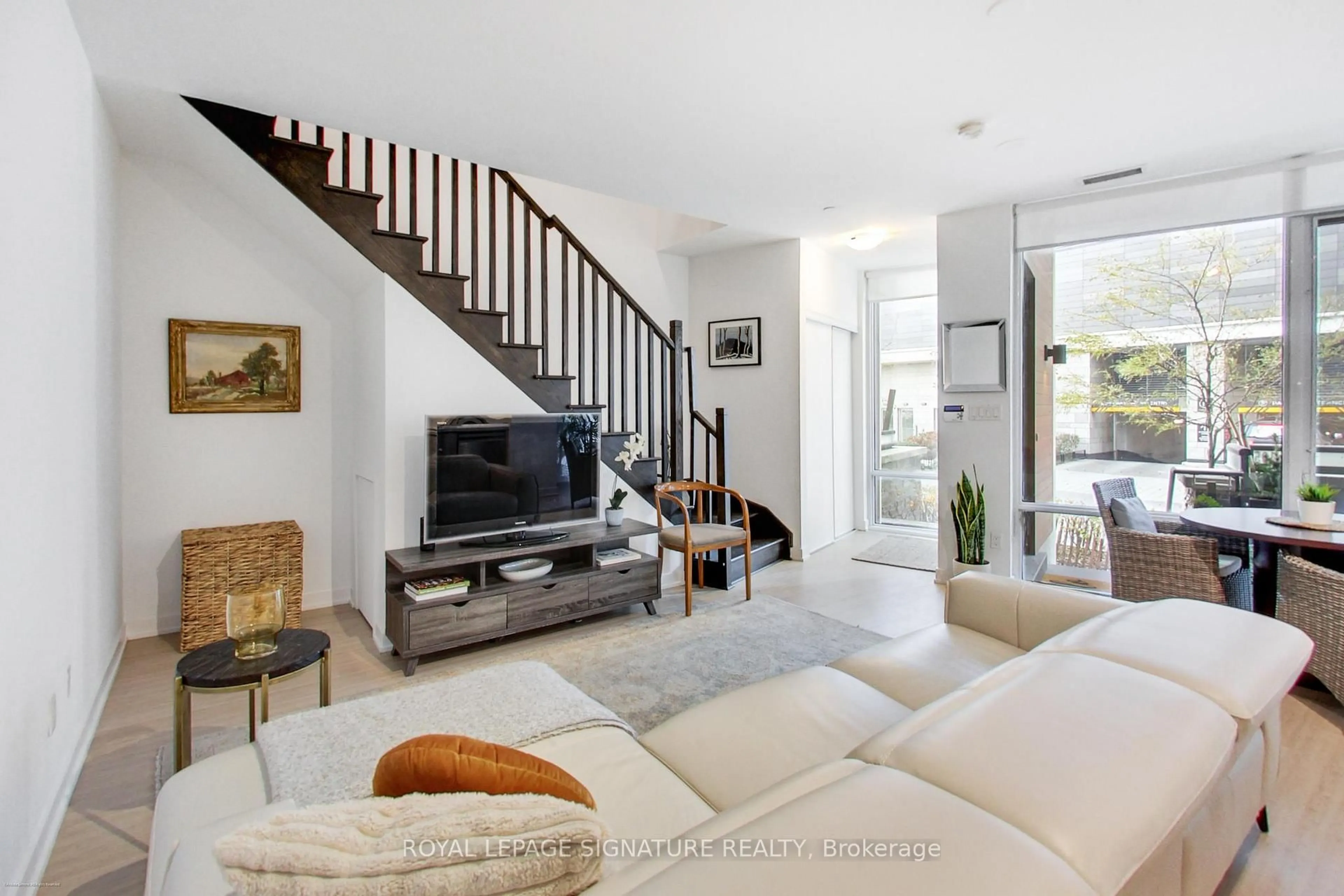 Living room with furniture, unknown for 30 Ordnance St #TH105, Toronto Ontario M6K 0C8