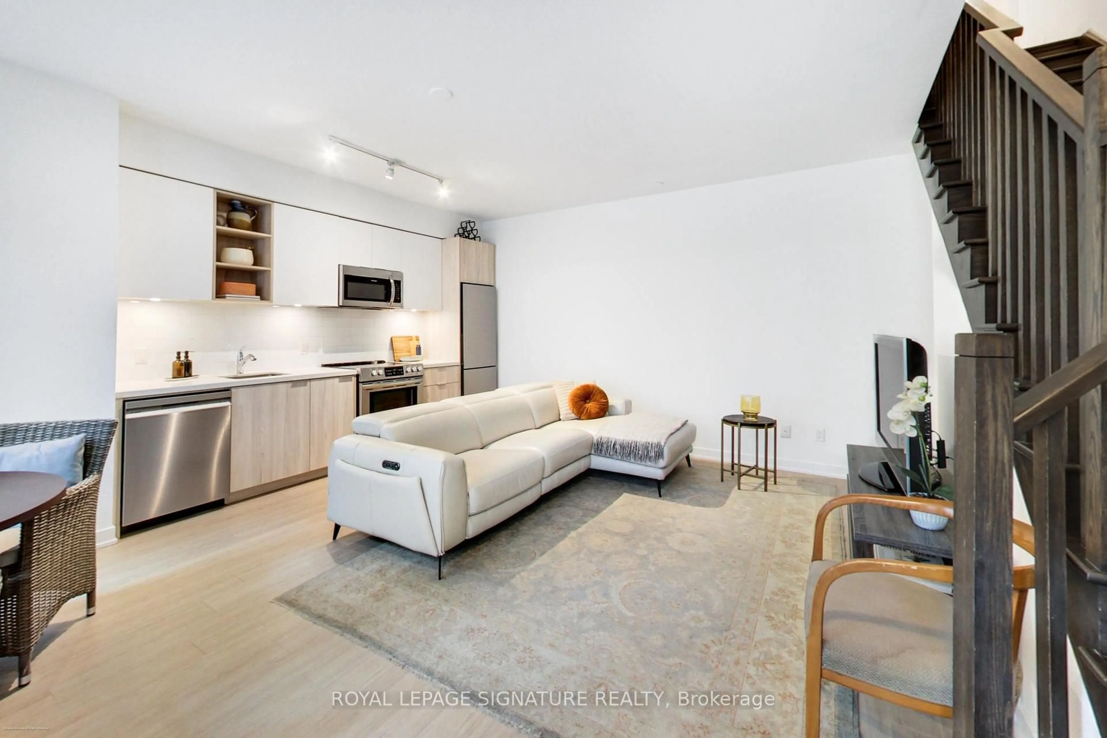 Living room with furniture, unknown for 30 Ordnance St #TH105, Toronto Ontario M6K 0C8