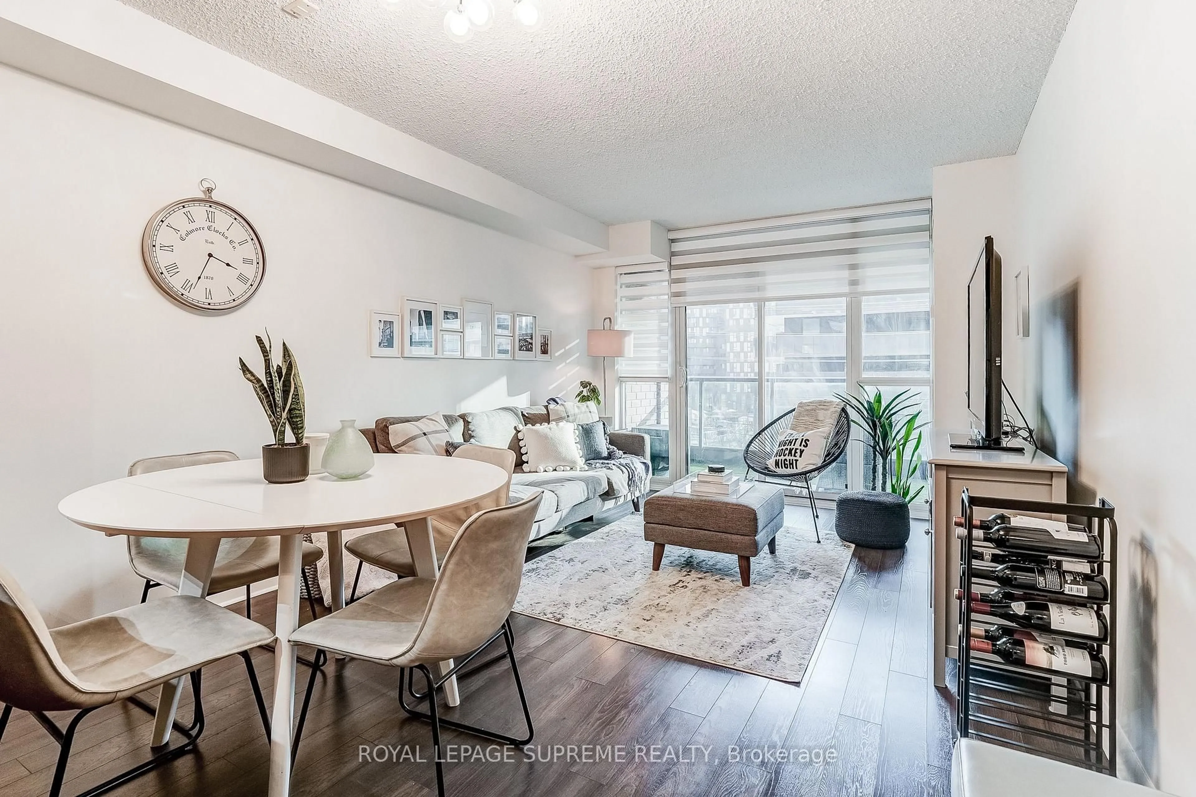 Living room with furniture, wood/laminate floor for 525 wilson Ave #459, Toronto Ontario M3H 0A7