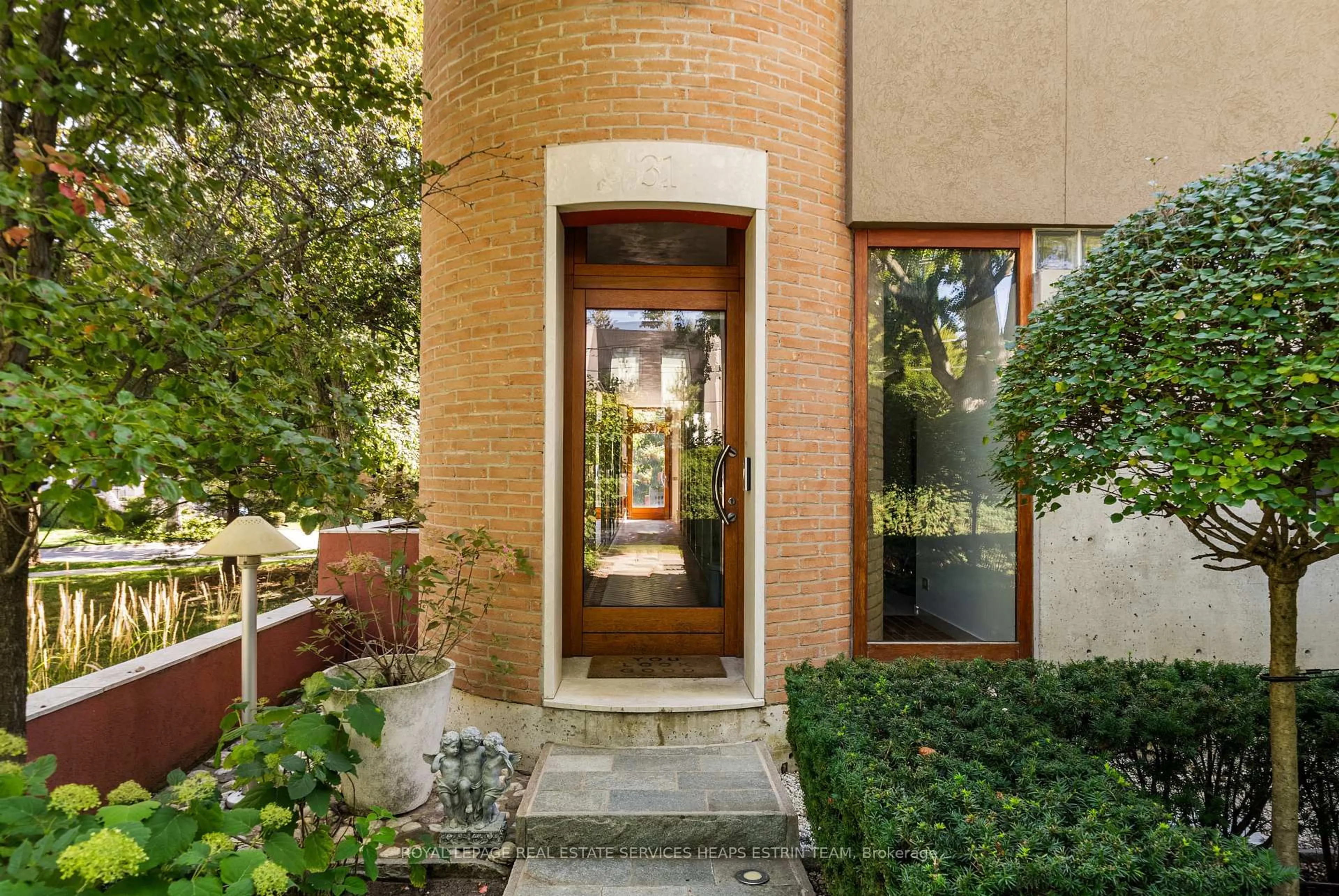 Home with brick exterior material, street for 31 Governors Rd, Toronto Ontario M4W 2E9