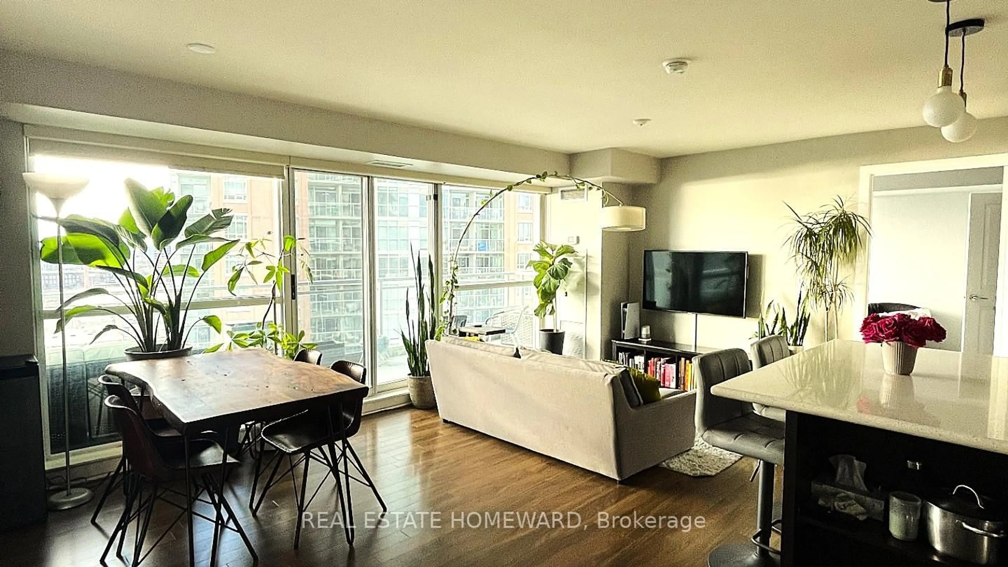 Living room with furniture, wood/laminate floor for 100 Western Battery Rd #2106, Toronto Ontario M6K 3S2