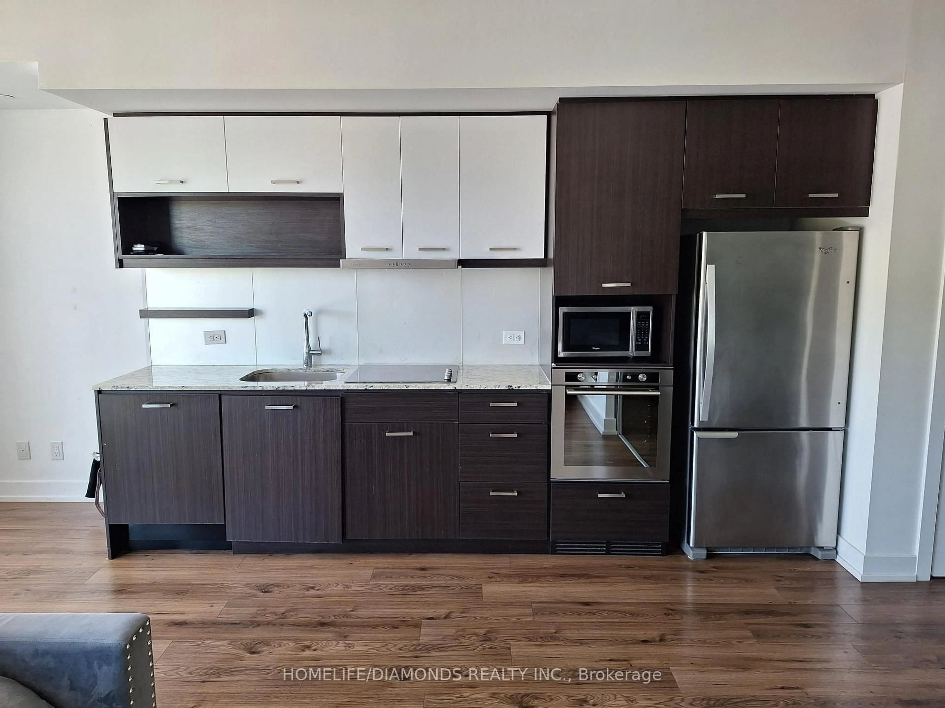 Open concept kitchen, wood/laminate floor for 170 Chiltern Hill Rd #507, Toronto Ontario M6C 0A9