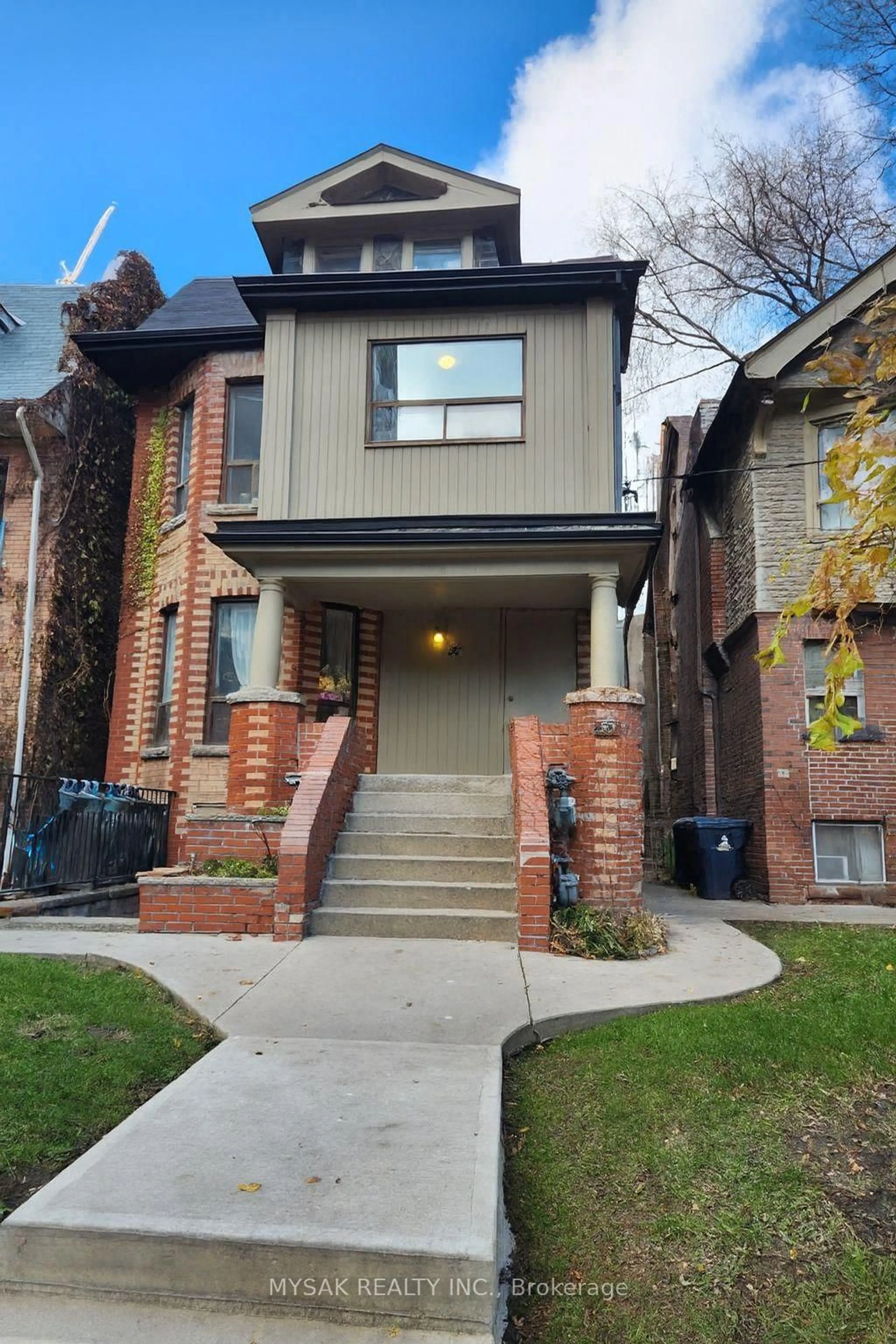 Home with brick exterior material, street for 50 Dundonald St, Toronto Ontario M4Y 1K2