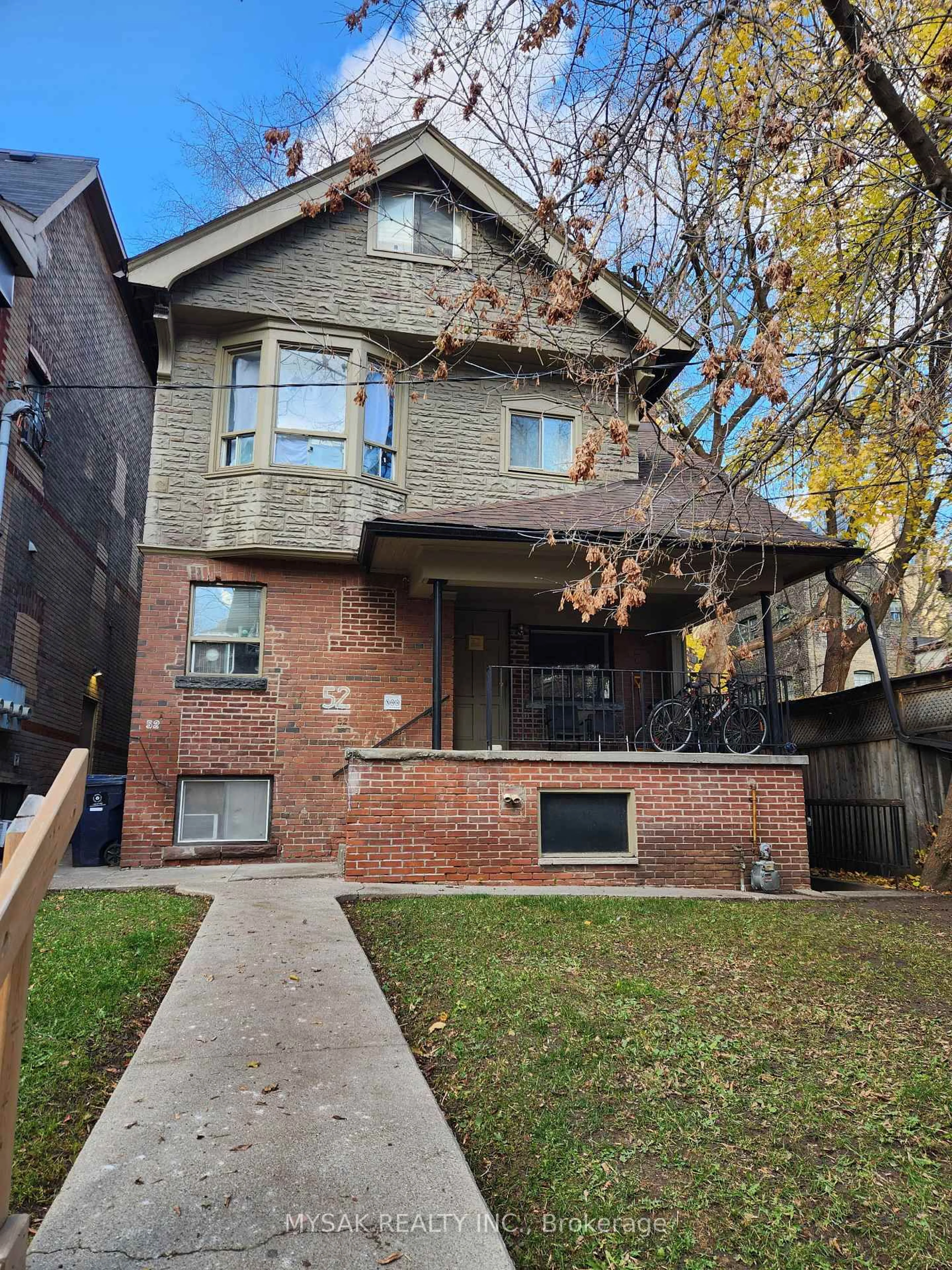 Home with brick exterior material, street for 52 Dundonald St, Toronto Ontario M4Y 1K2
