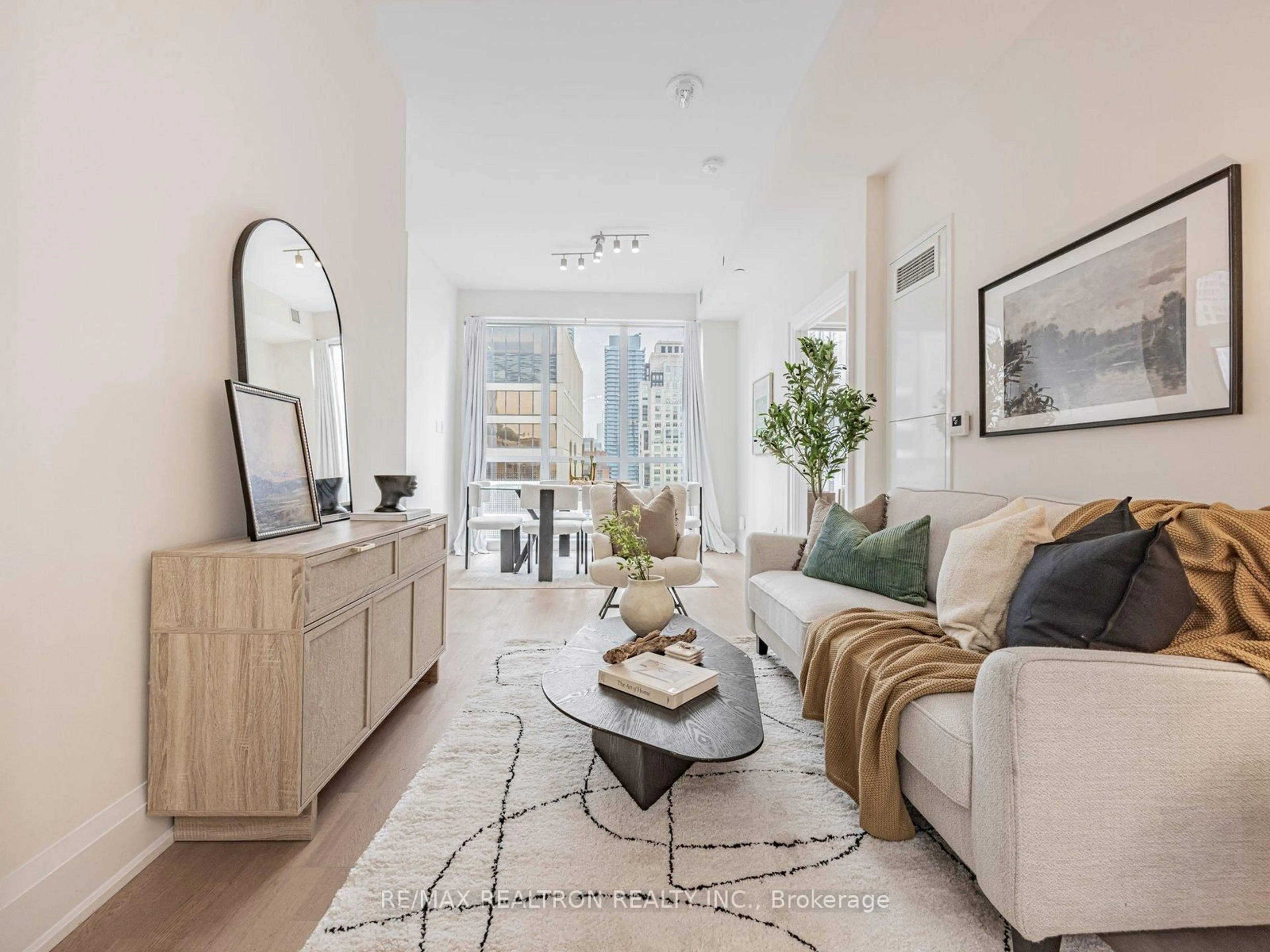 Living room with furniture, unknown for 88 Cumberland St #1801, Toronto Ontario M5R 1A3