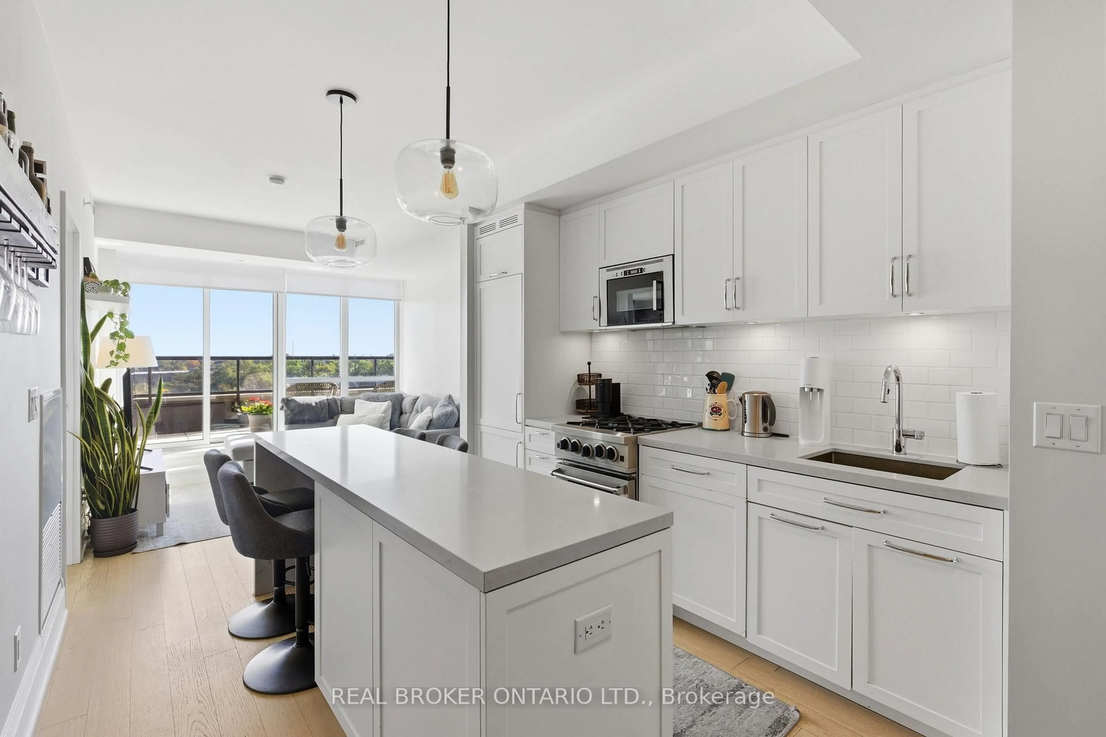 Open concept kitchen, ceramic/tile floor for 25 Malcolm Rd #606, Toronto Ontario M4G 0C1