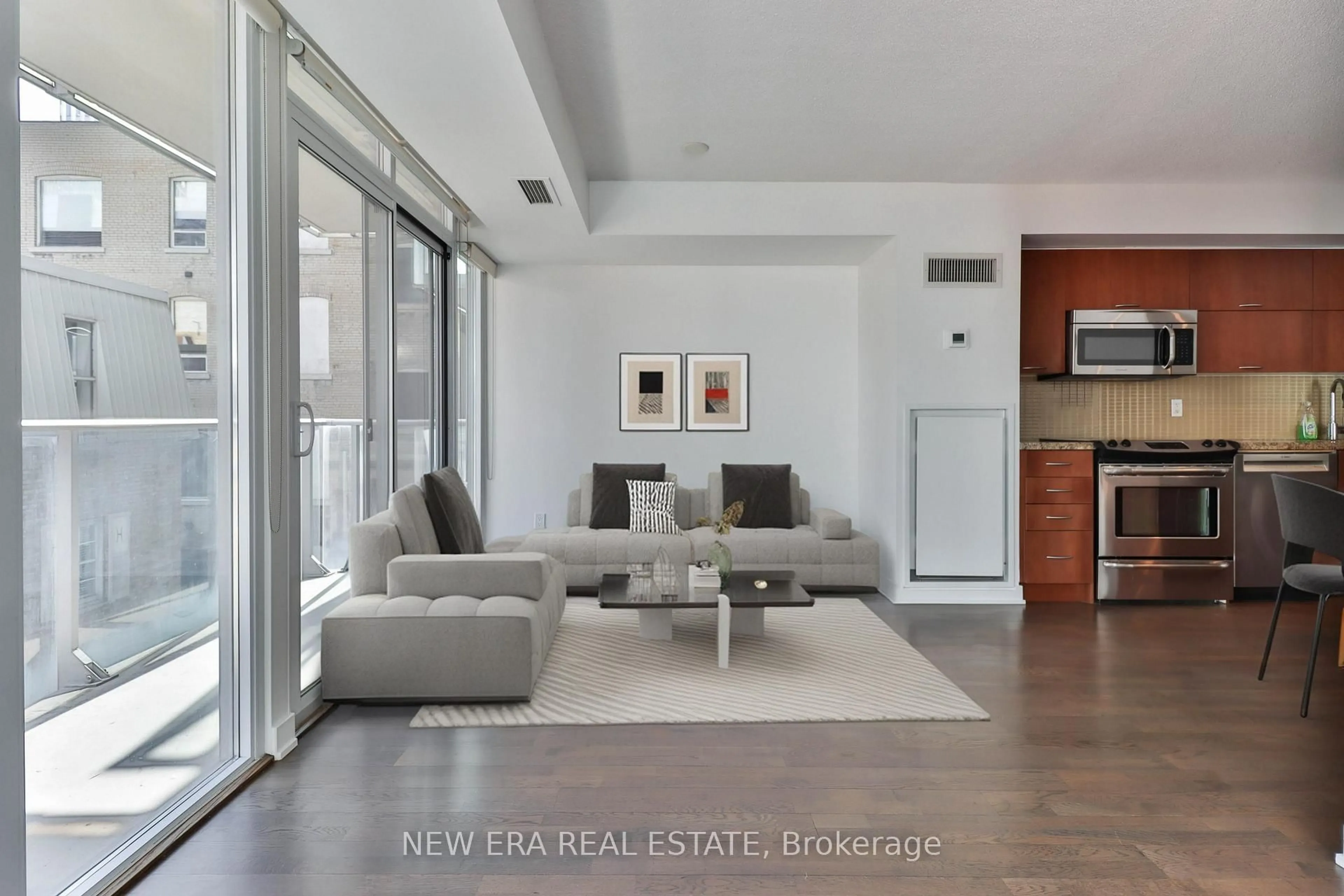 Living room with furniture, unknown for 126 Simcoe St #411, Toronto Ontario M5H 4E6