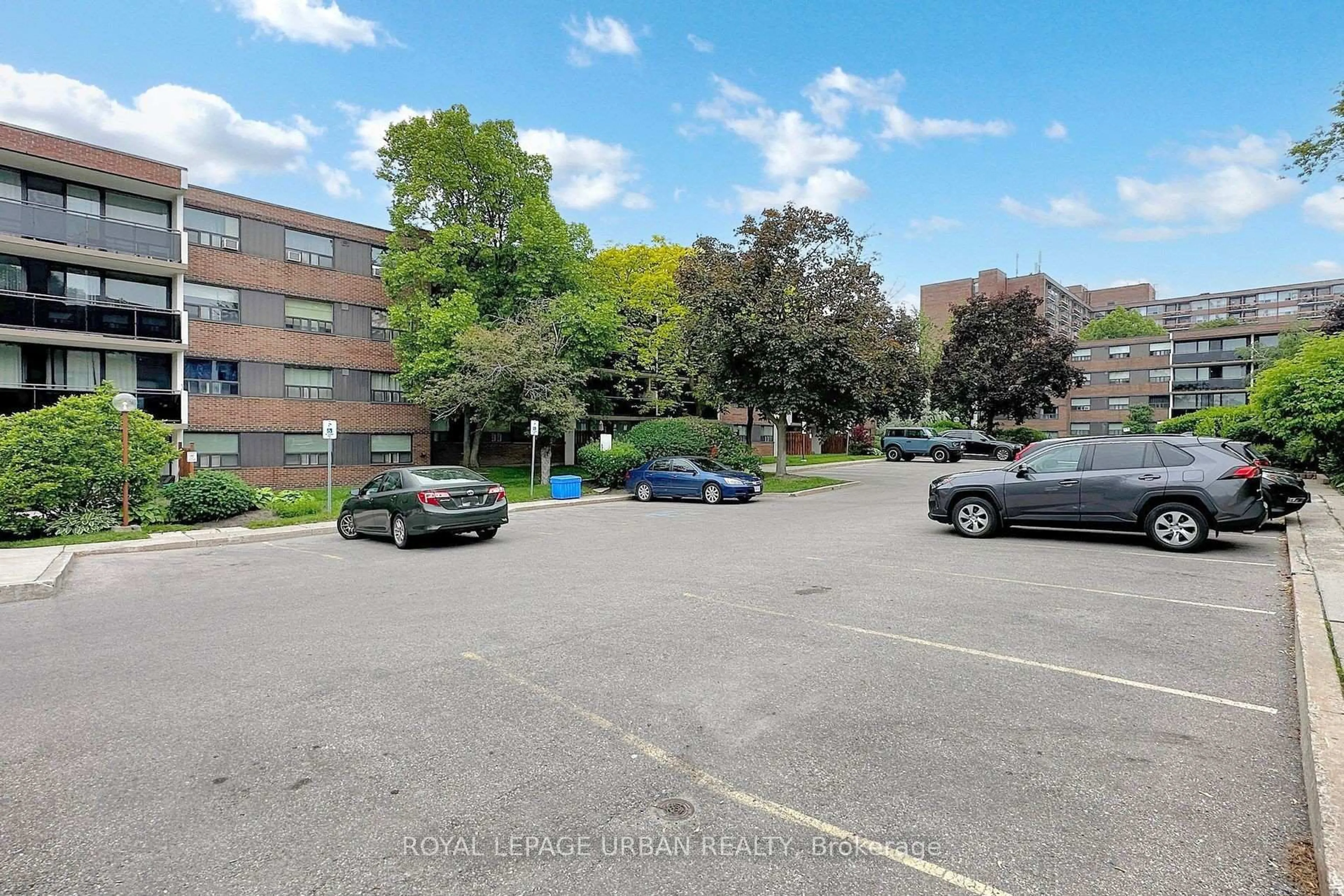 A pic from outside/outdoor area/front of a property/back of a property/a pic from drone, street for 20 Sunrise Ave #102, Toronto Ontario M4A 2R2