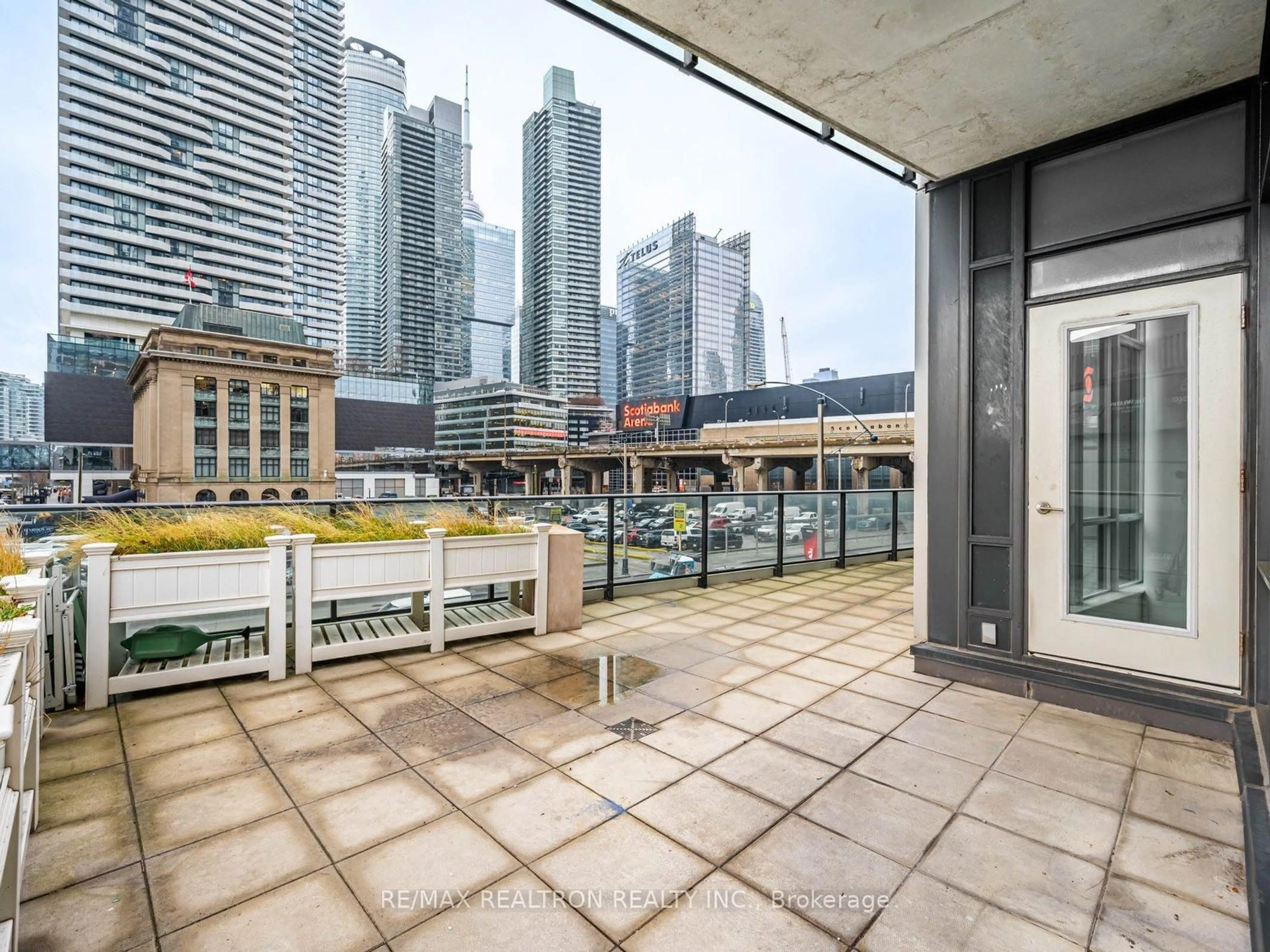 Balcony in the apartment, city buildings view from balcony for 33 Bay St #217, Toronto Ontario M5J 2Z3