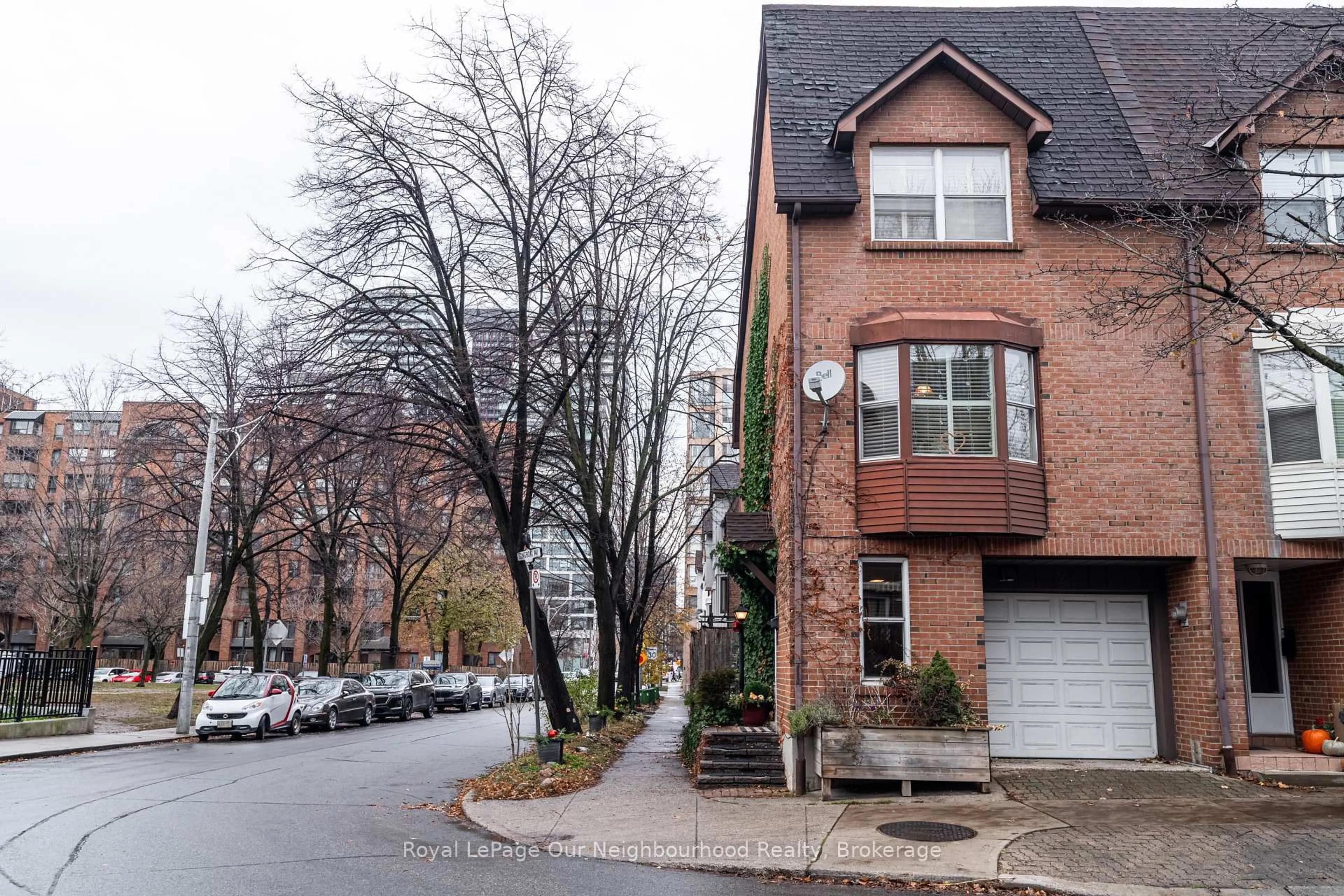 Home with brick exterior material, street for 2 Longboat Ave, Toronto Ontario M5A 4E1