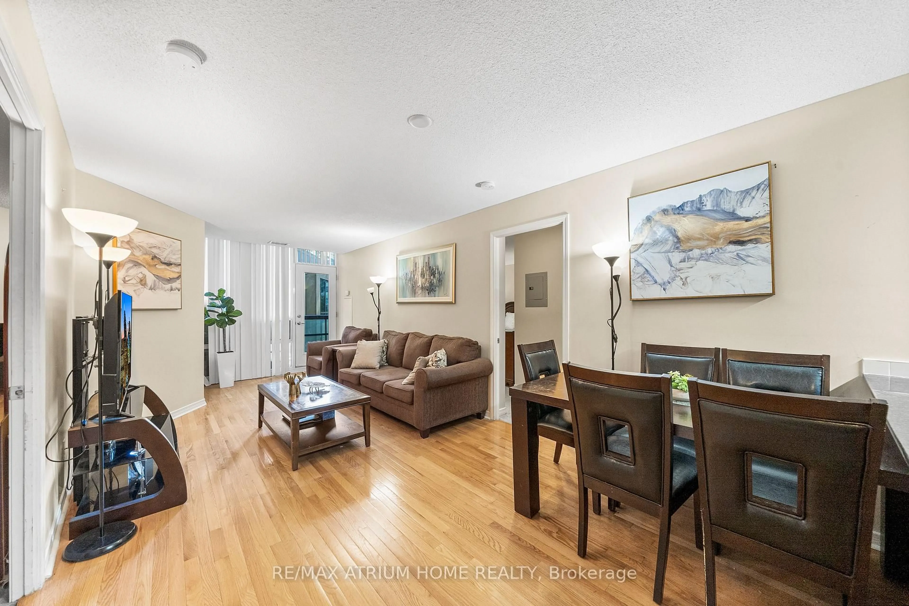 Living room with furniture, wood/laminate floor for 509 Beecroft Rd #317, Toronto Ontario M2N 0A3