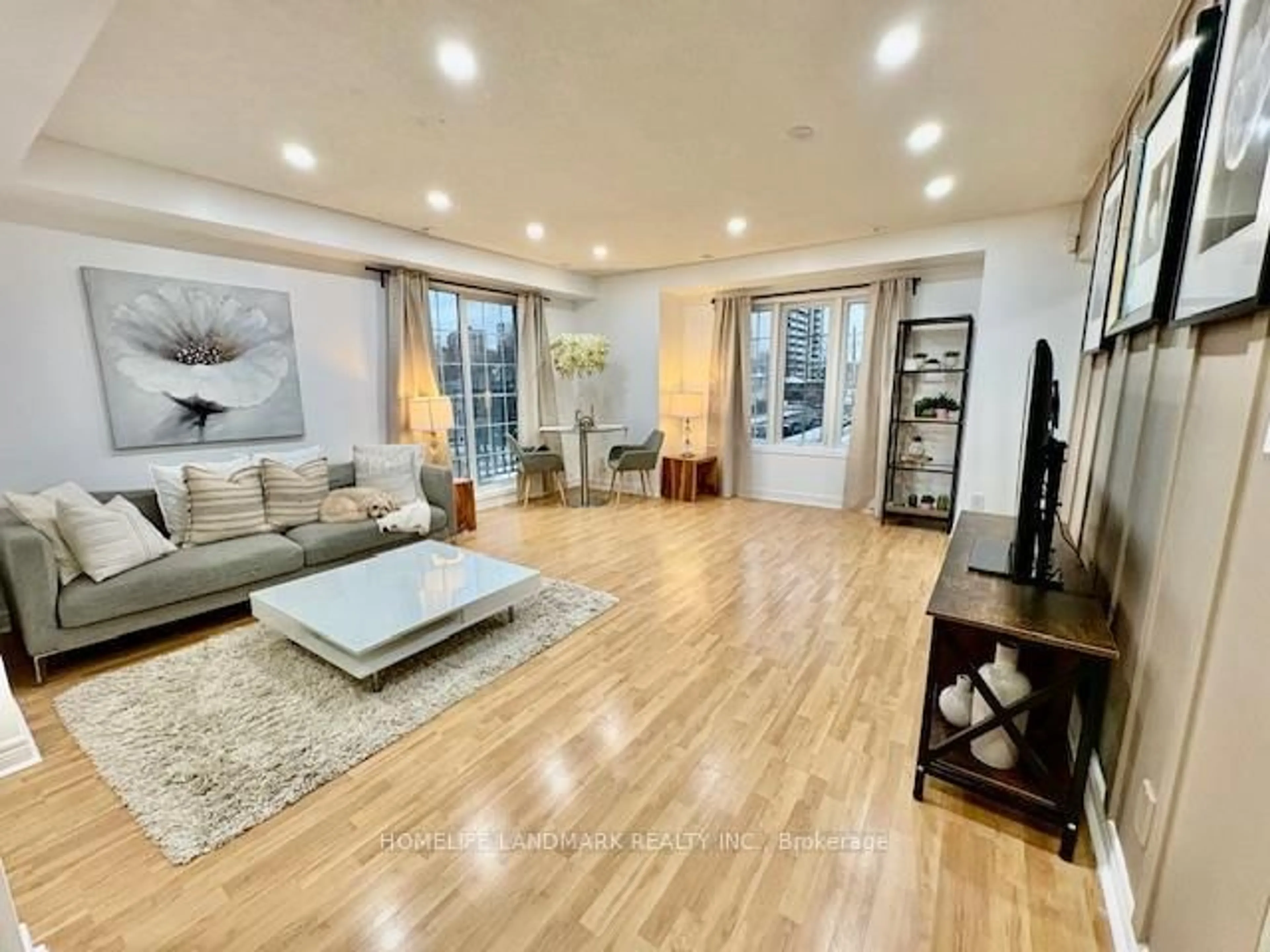 Living room with furniture, wood/laminate floor for 45 Cedarcroft Blvd #5, Toronto Ontario M2R 3Y2