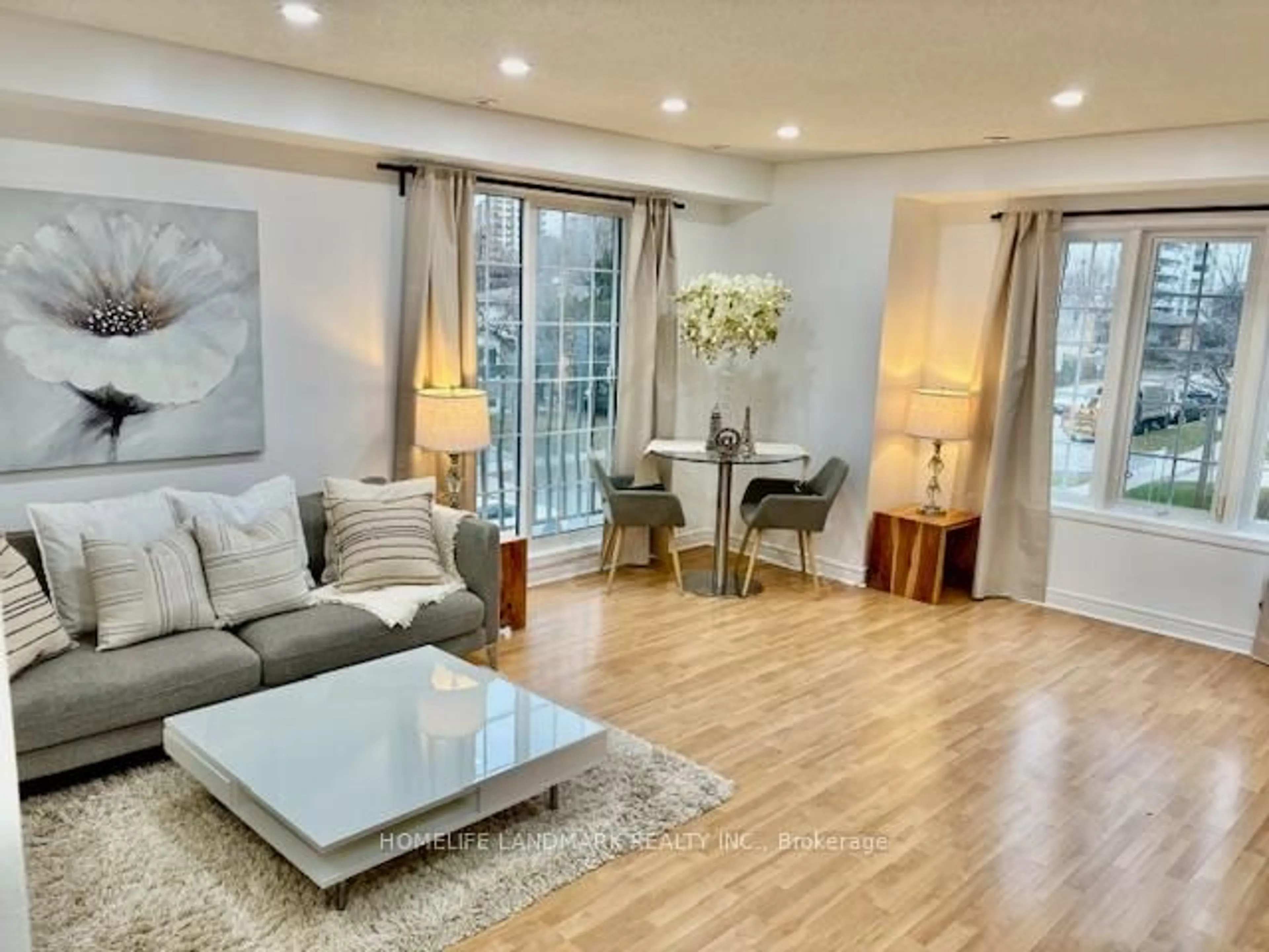 Living room with furniture, wood/laminate floor for 45 Cedarcroft Blvd #5, Toronto Ontario M2R 3Y2