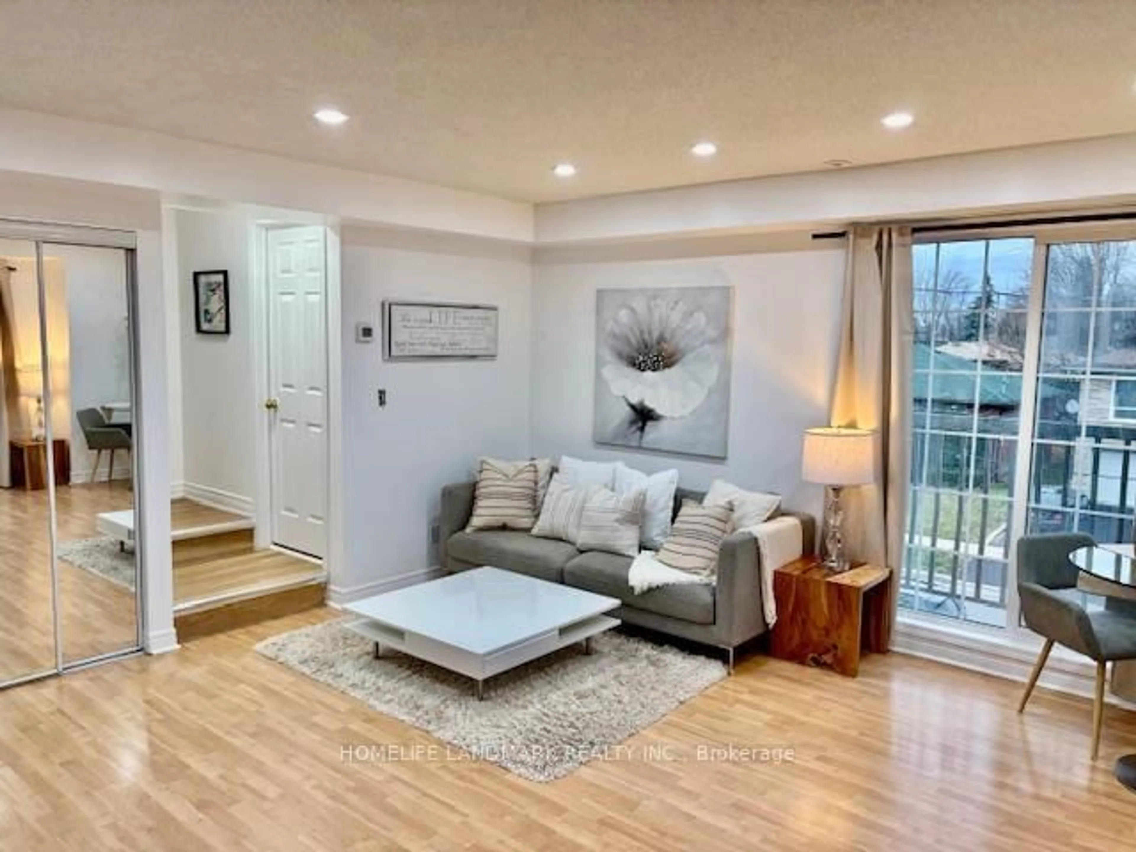 Living room with furniture, wood/laminate floor for 45 Cedarcroft Blvd #5, Toronto Ontario M2R 3Y2