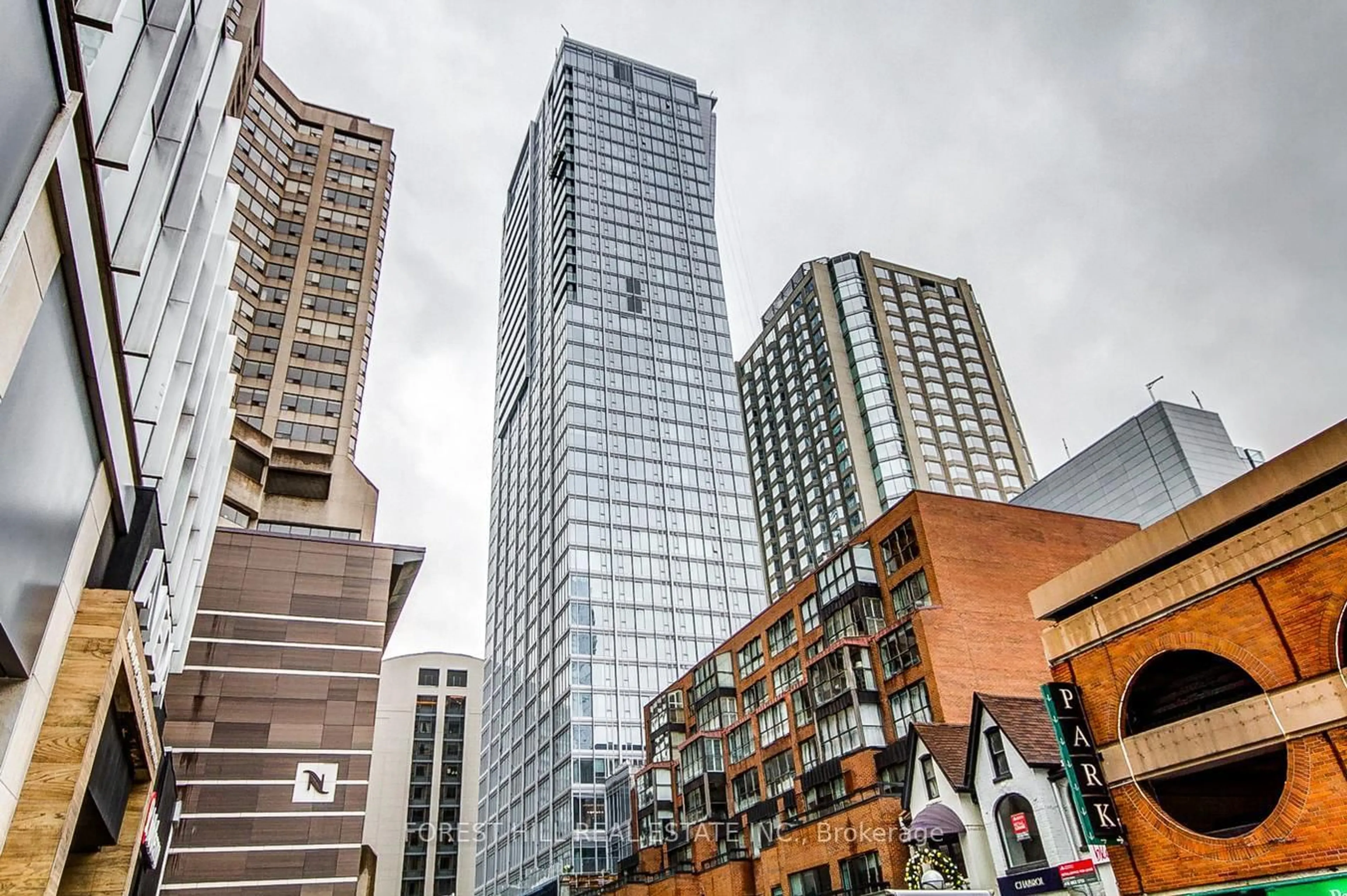 Patio, city buildings view from balcony for 200 Cumberland St #2602, Toronto Ontario M5R 0B6